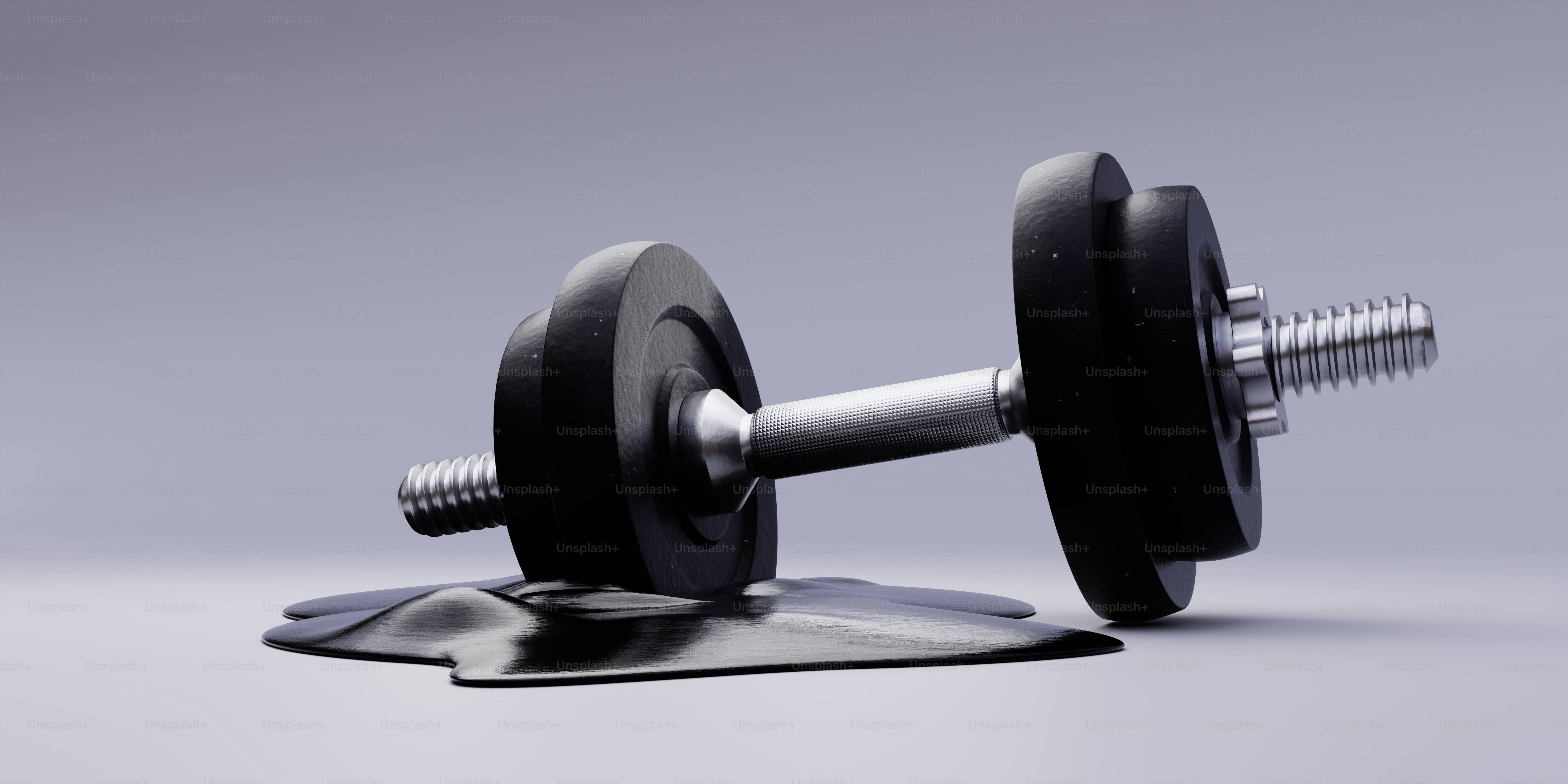 Dumbbell resting on a strange, liquid surface.