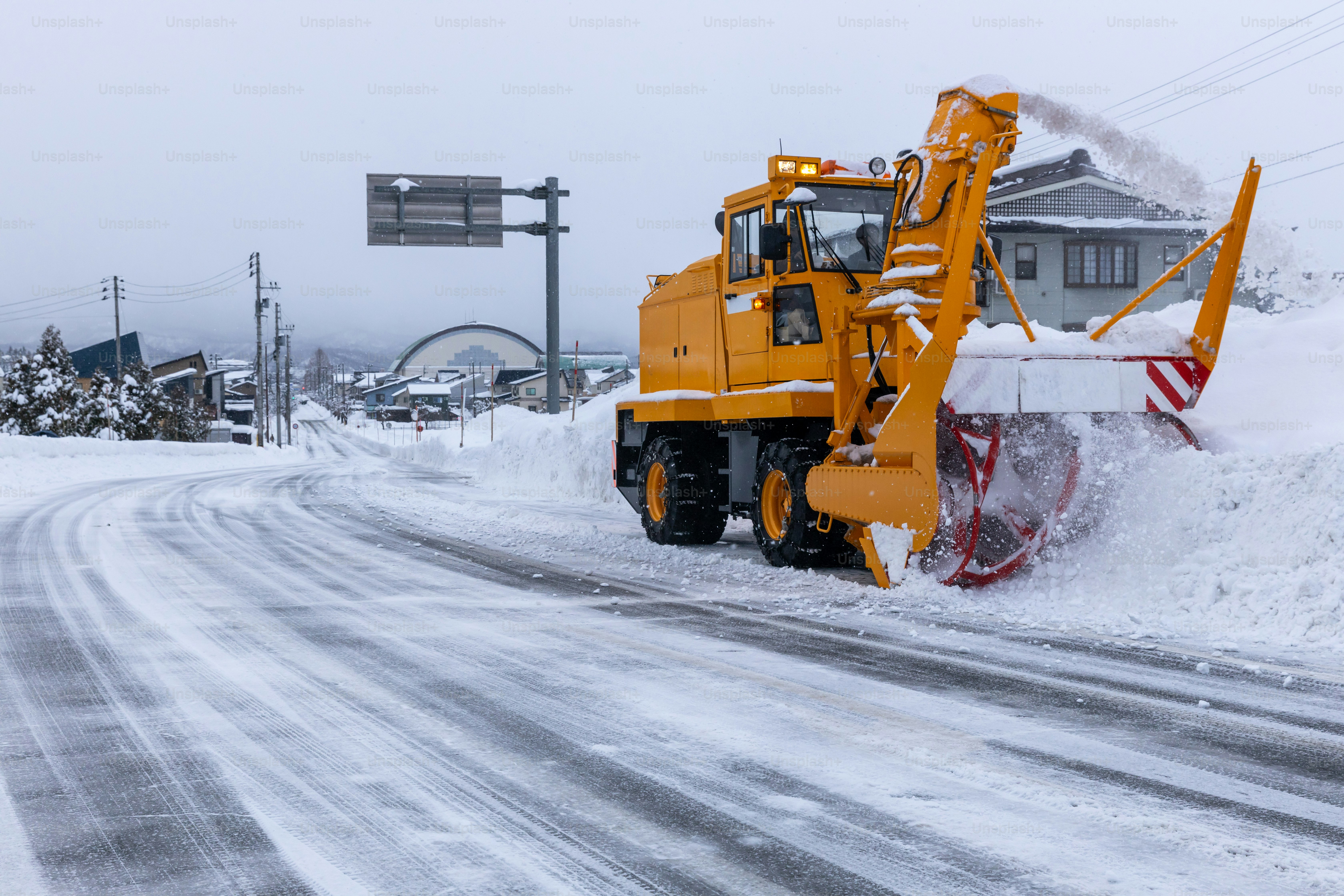 Snowplow removing heavy snow. Yamagata, Japan.