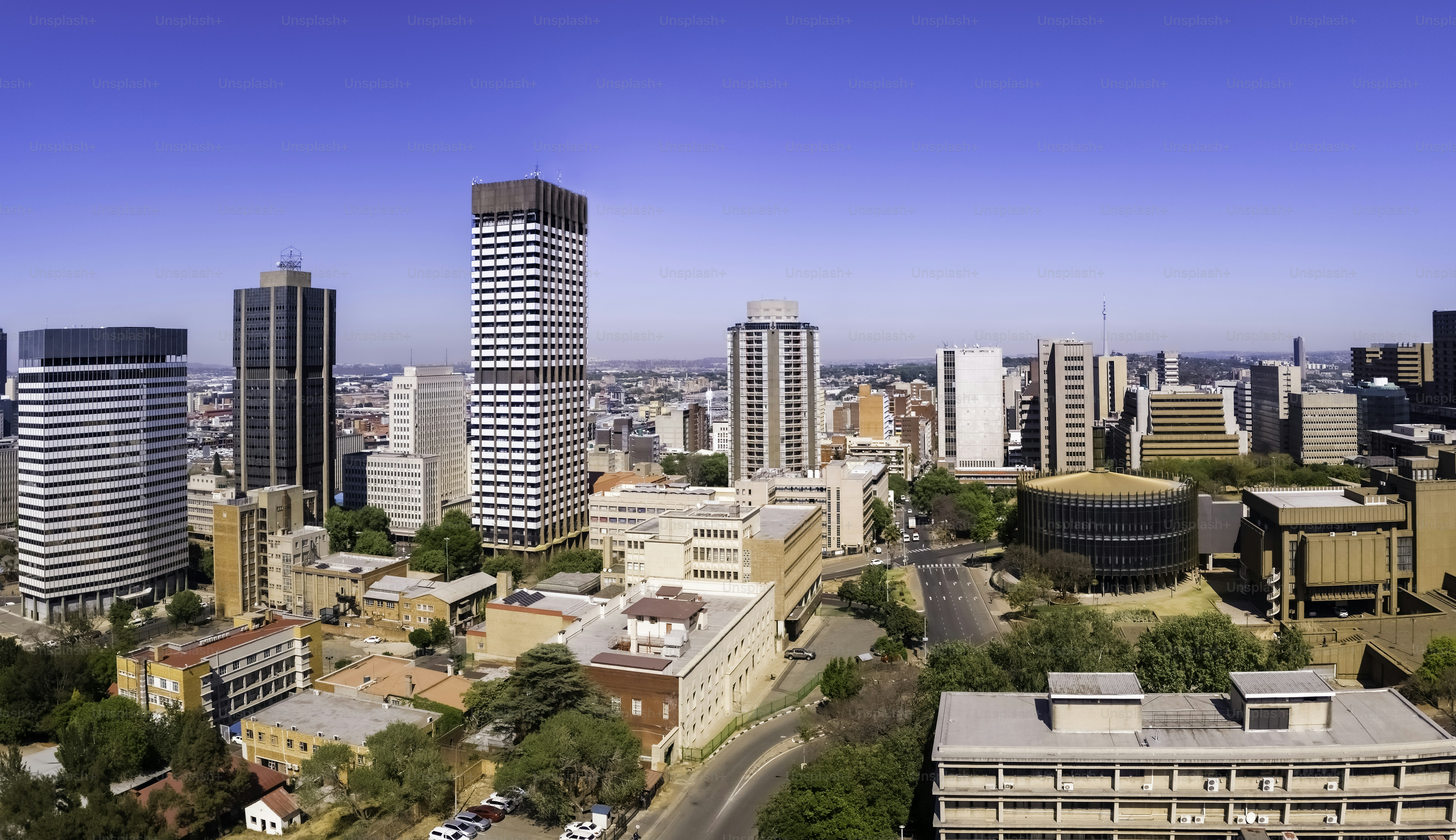 Johannesburg city centre with Bramfontein and the round Council building.  Johannesburg is also known as Jozi, Jo'burg or eGoli, is the largest city in South Africa.