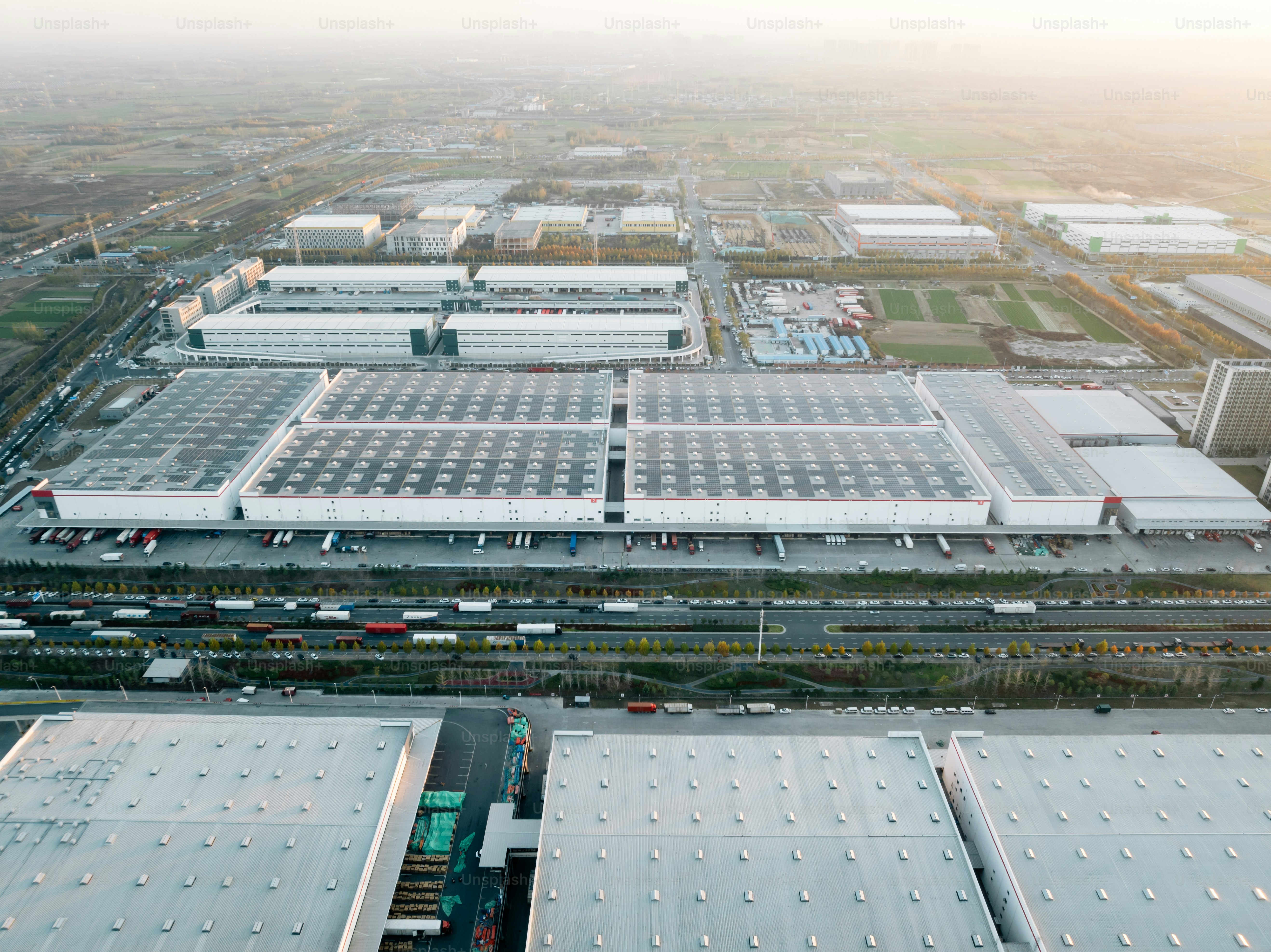 Aerial view of a factory with rooftop solar power