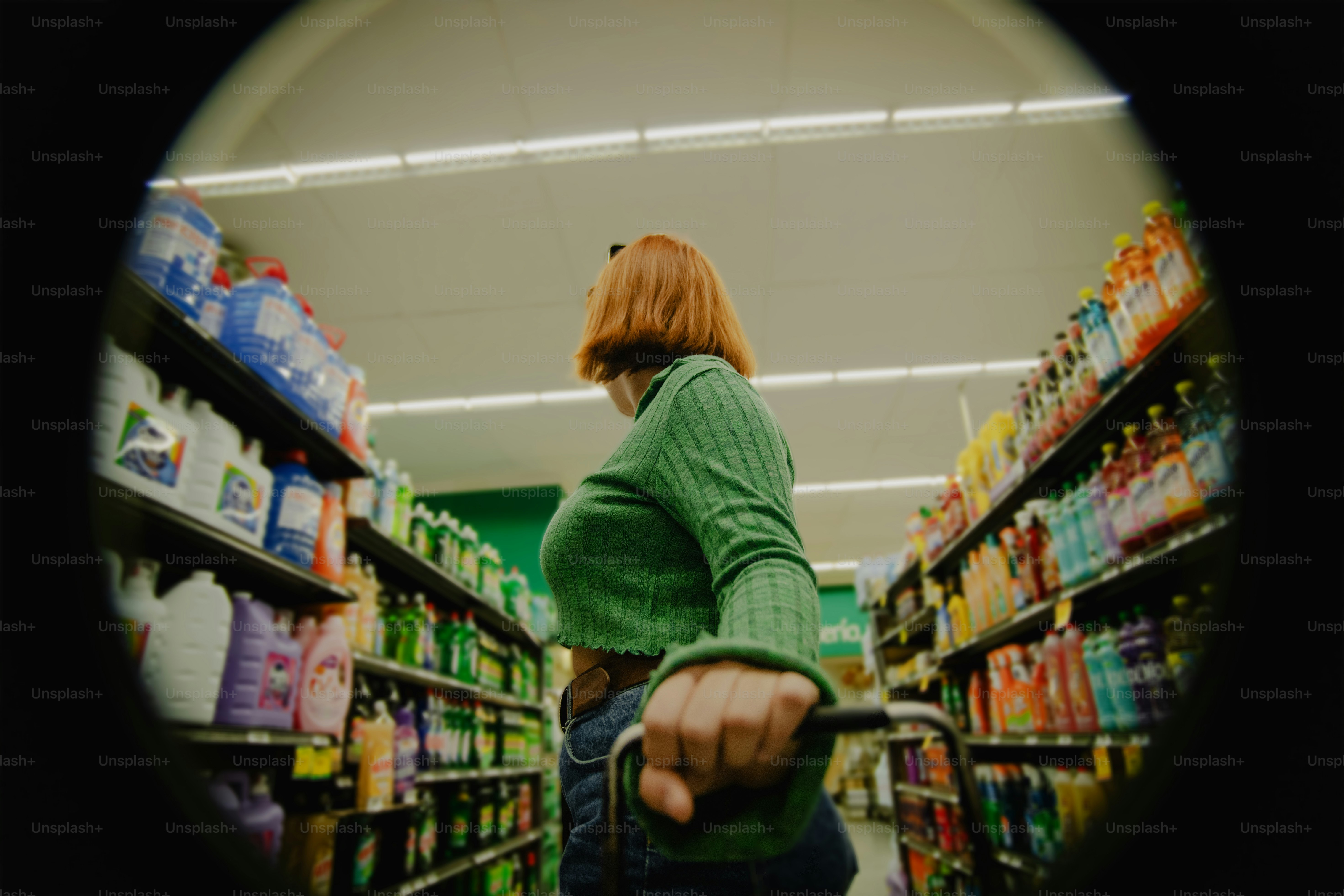 Woman shops for groceries in a supermarket.