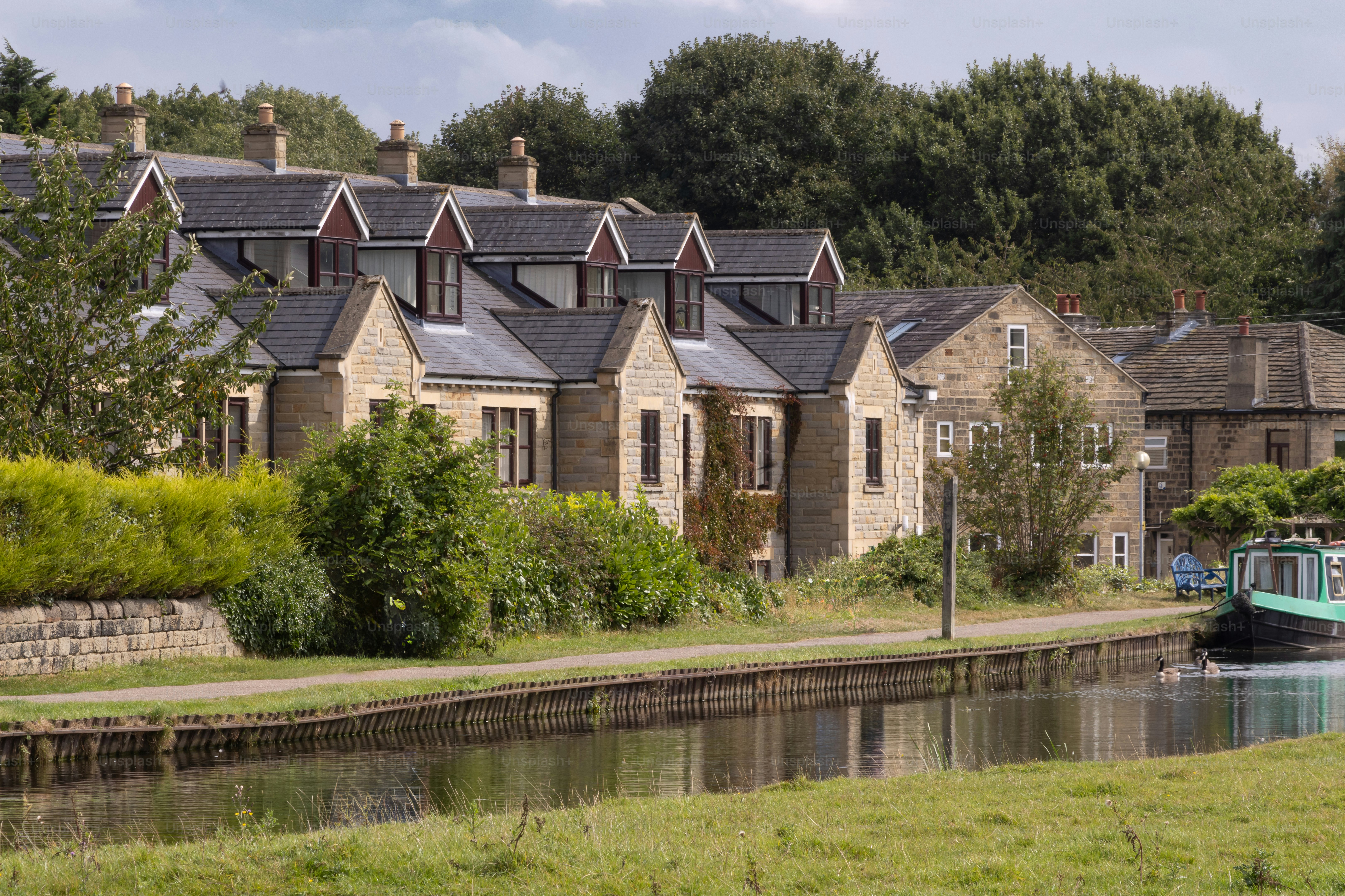 Houses overlooking the Leeds Liverpool canal near Rodley, Leeds, West Yorkshire.