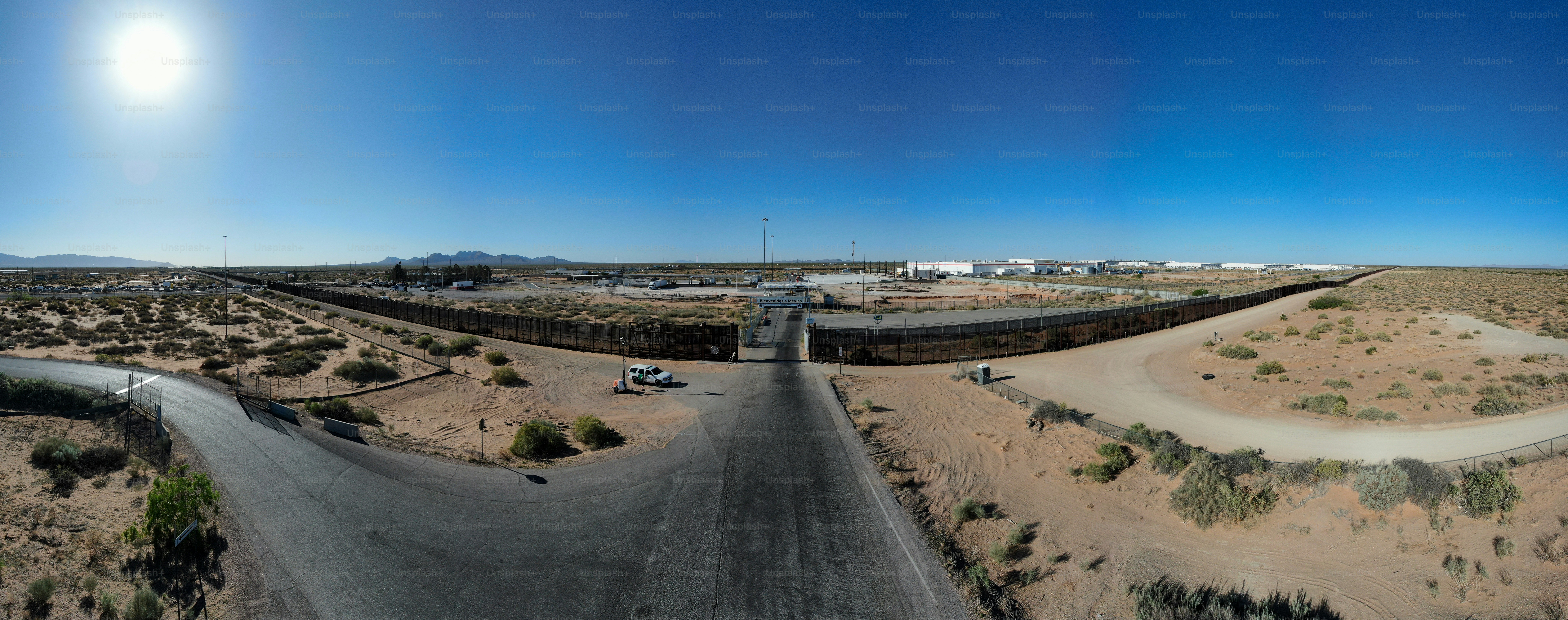 A Panoramic shot of An SUV Border Patrol Stands Guard at the US Customs ...