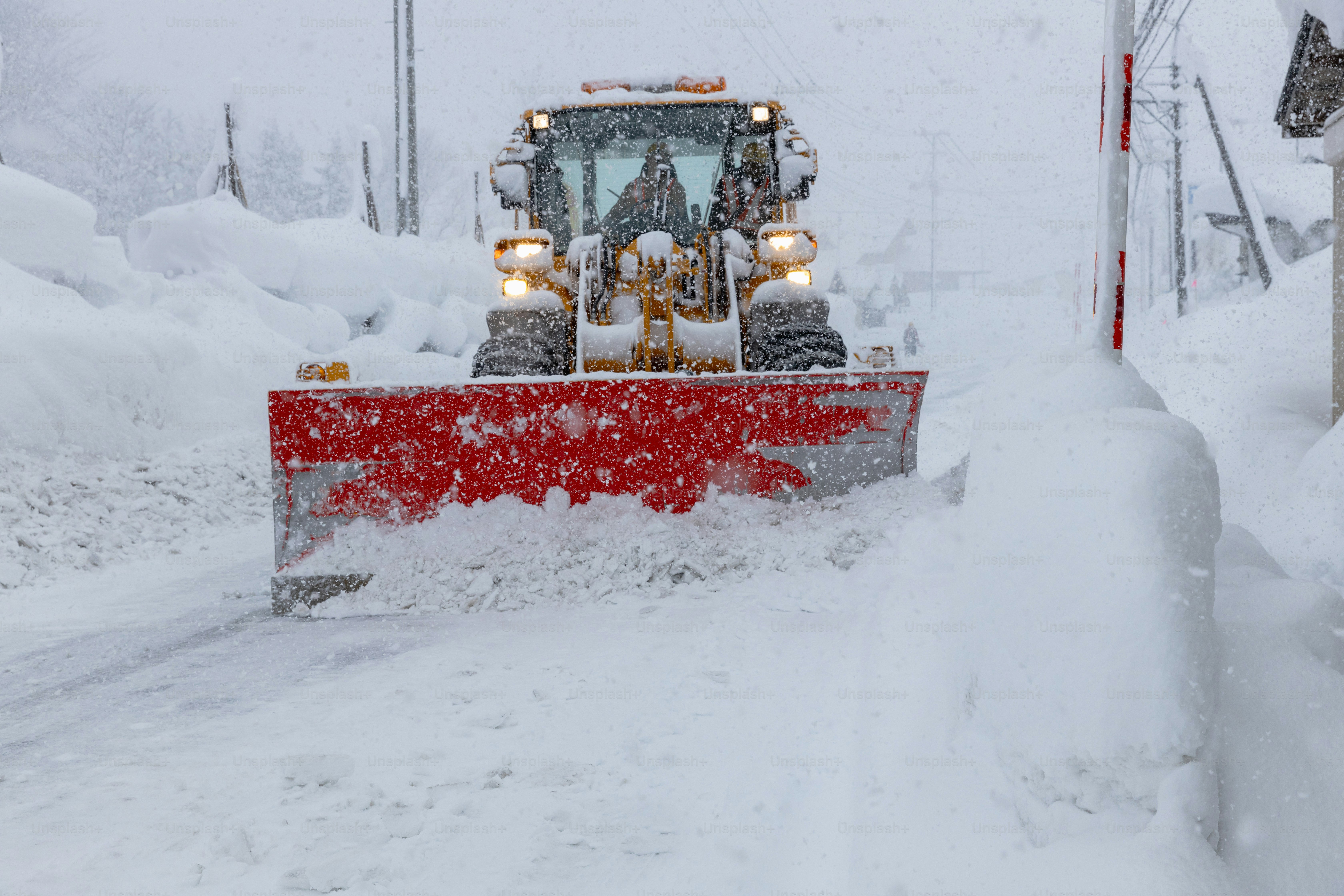 A snowplow clearing the snow from roads. Yamagata, Japan.