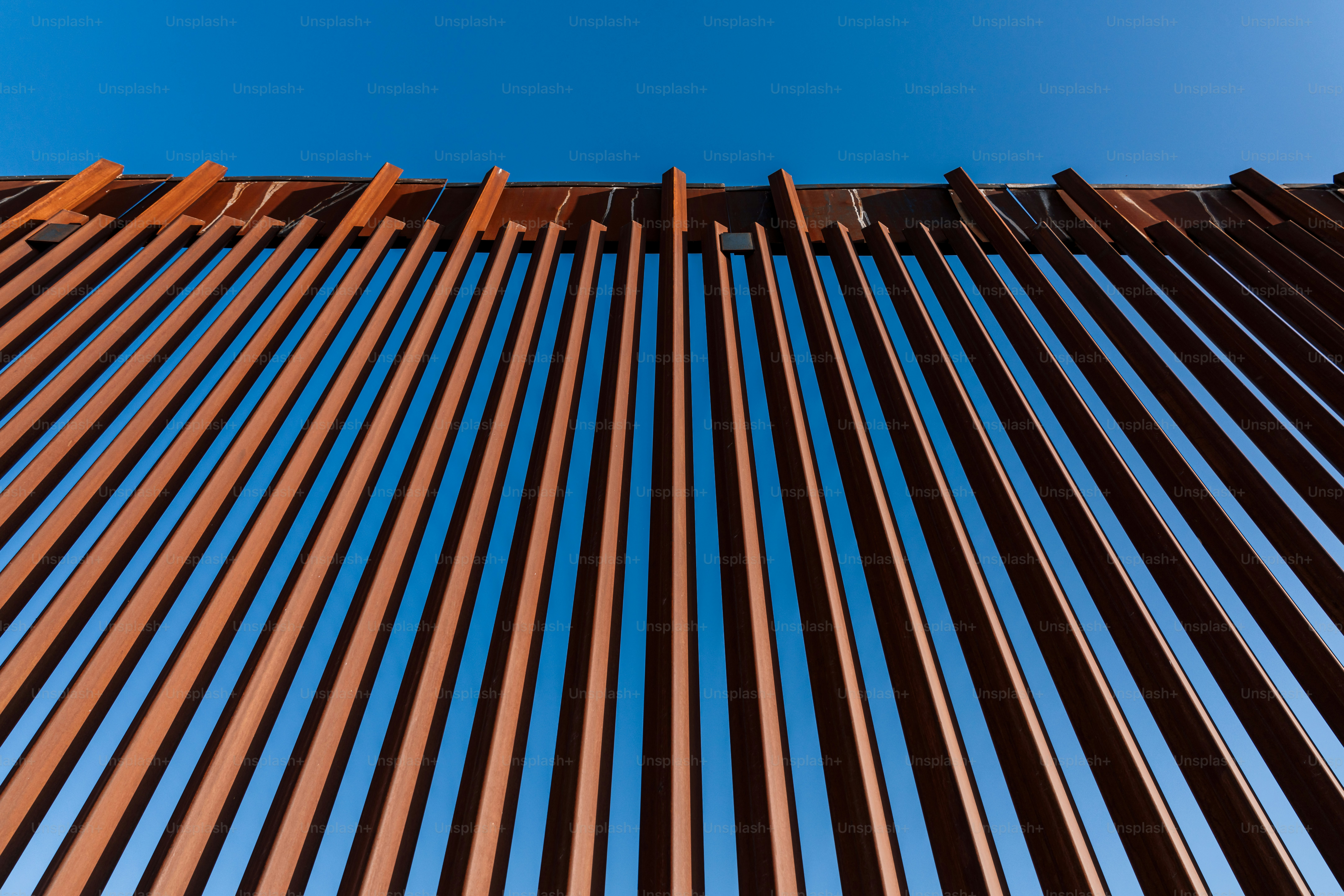 U.S. Southern Border Wall Fence separating El Paso, Texas and Ciudad Juárez, Mexico in Springtime