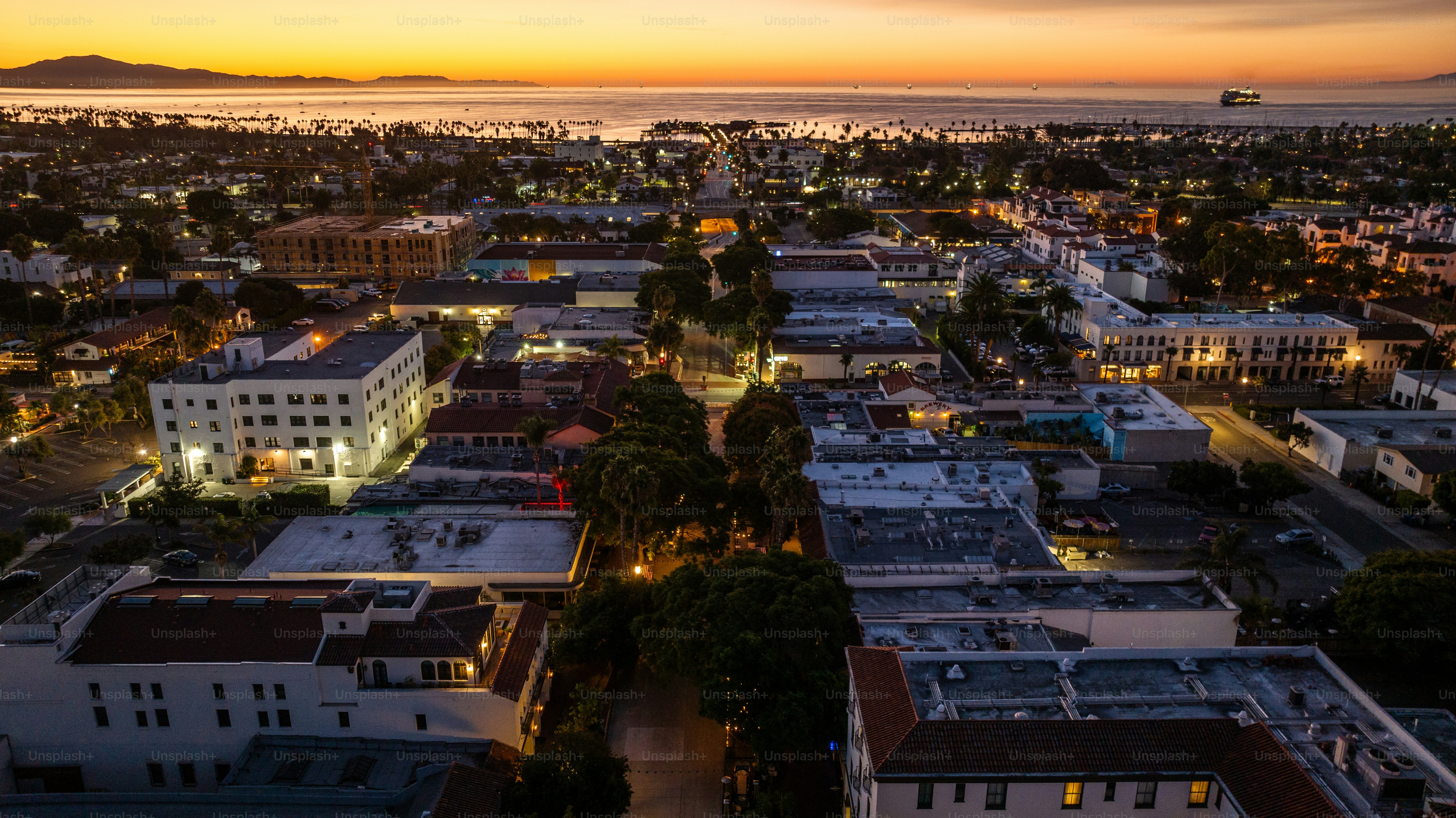 Aerial view, looking East down State Street towards the Santa Barbara beach and marina.