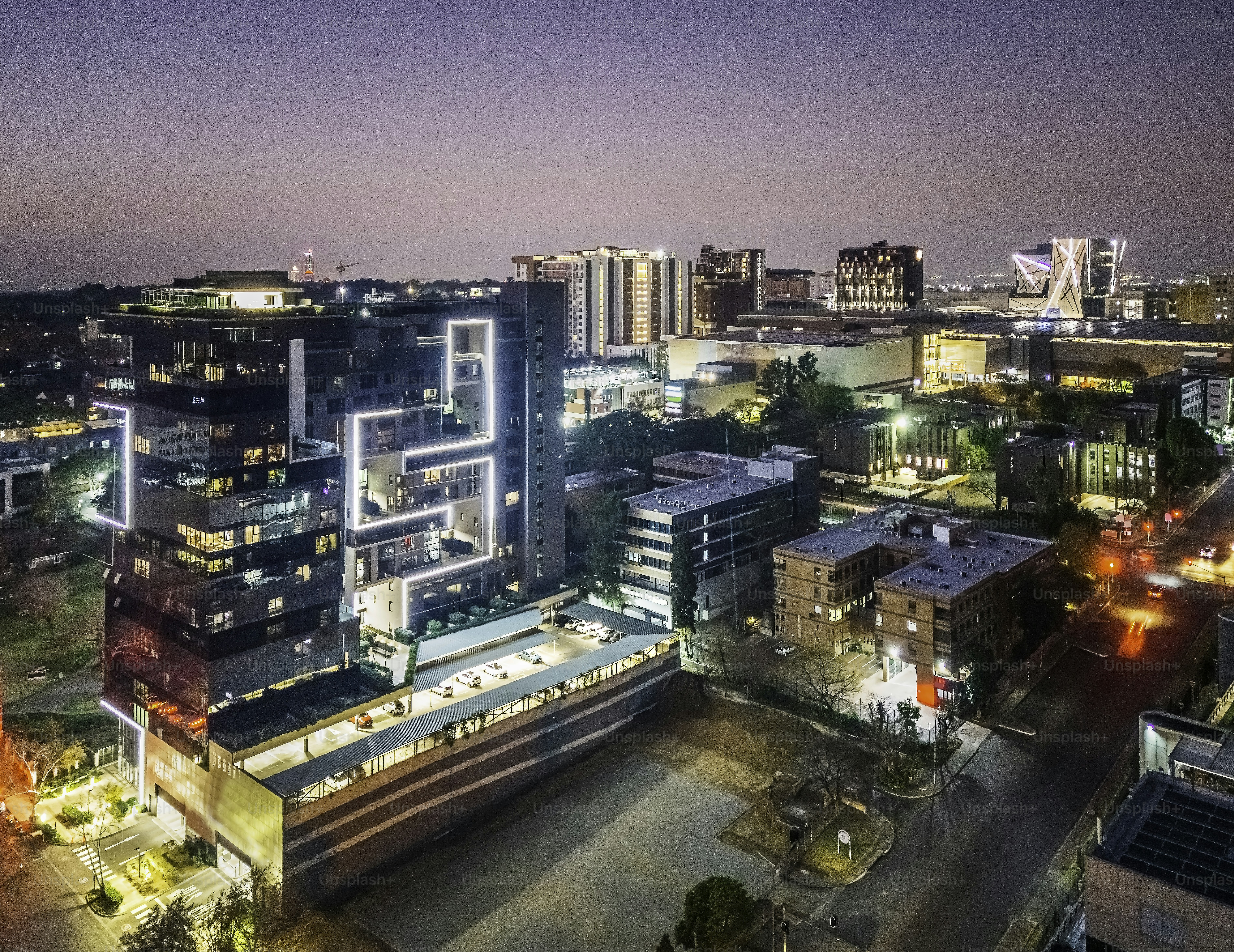 Rosebank seen from above showing the urban area with upmarket apartments, corporate business and Rosebank Mall. Rosebank also features the Gautrain suburban metro station.