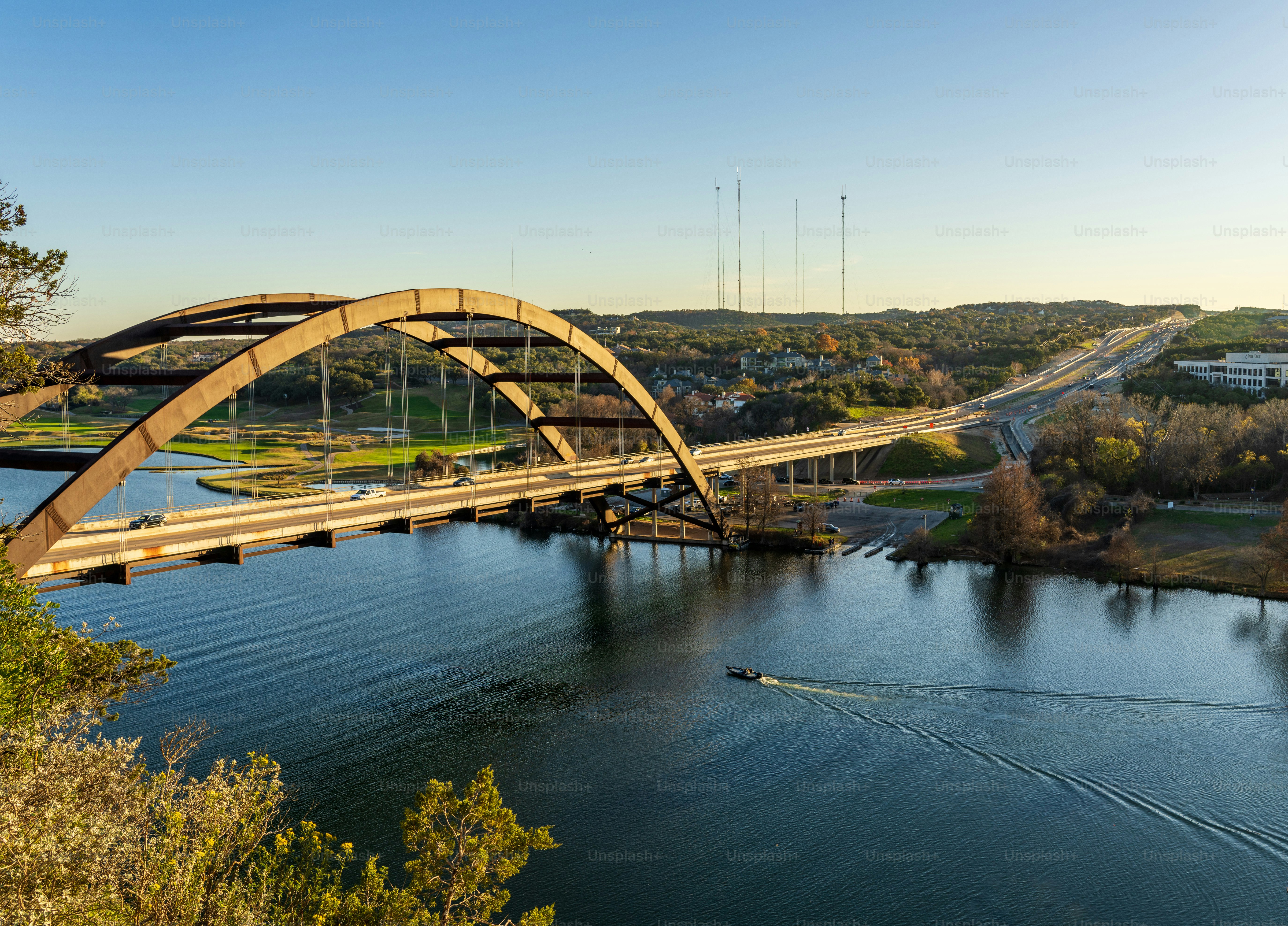 Pennybacker suspension bridge or 360 Bridge from overlook by Colorado River near Austin TX
