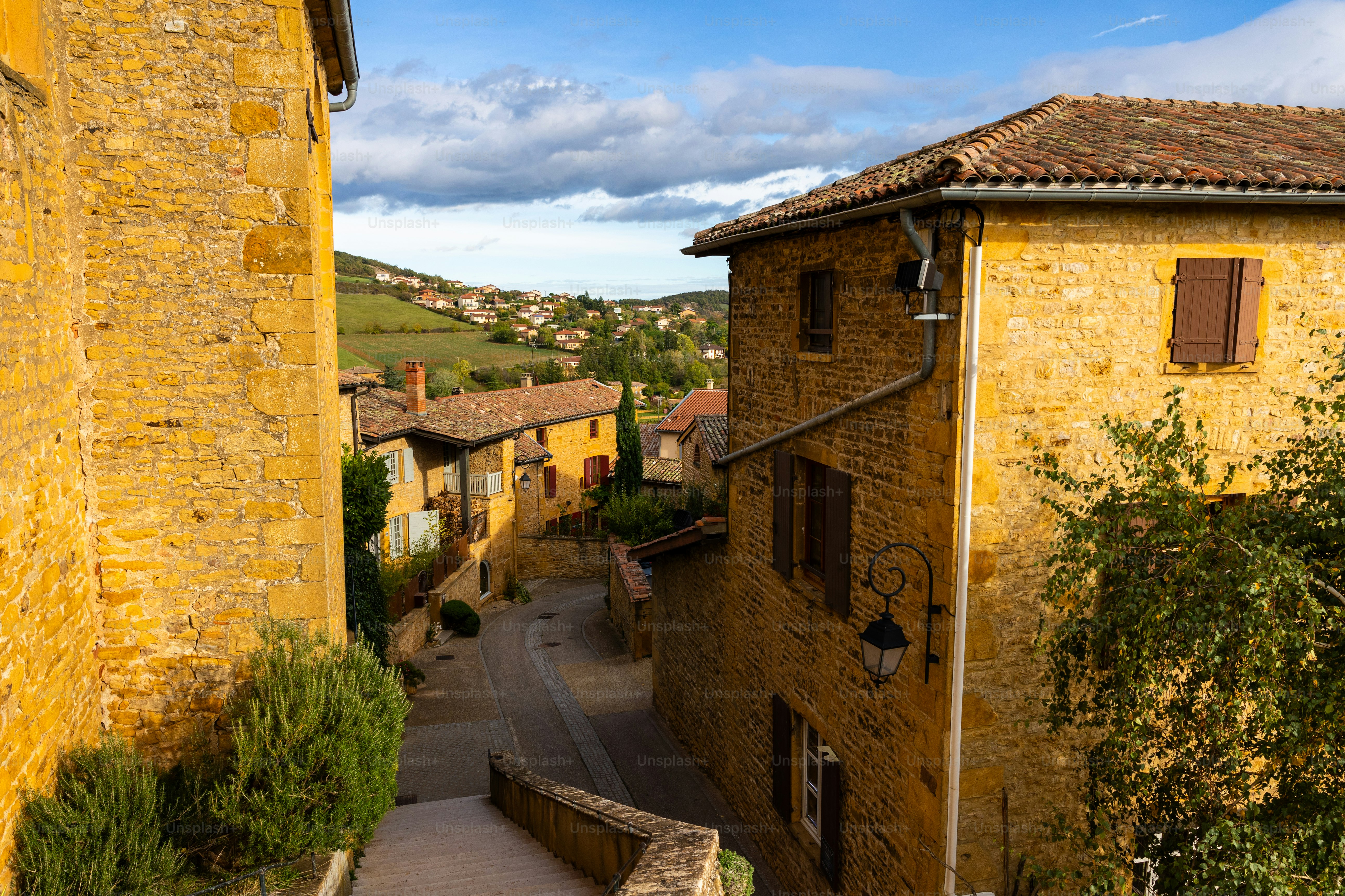 View from Saint-Mathieu Church in Oingt overlooking the village known for its golden stones near Lyon
