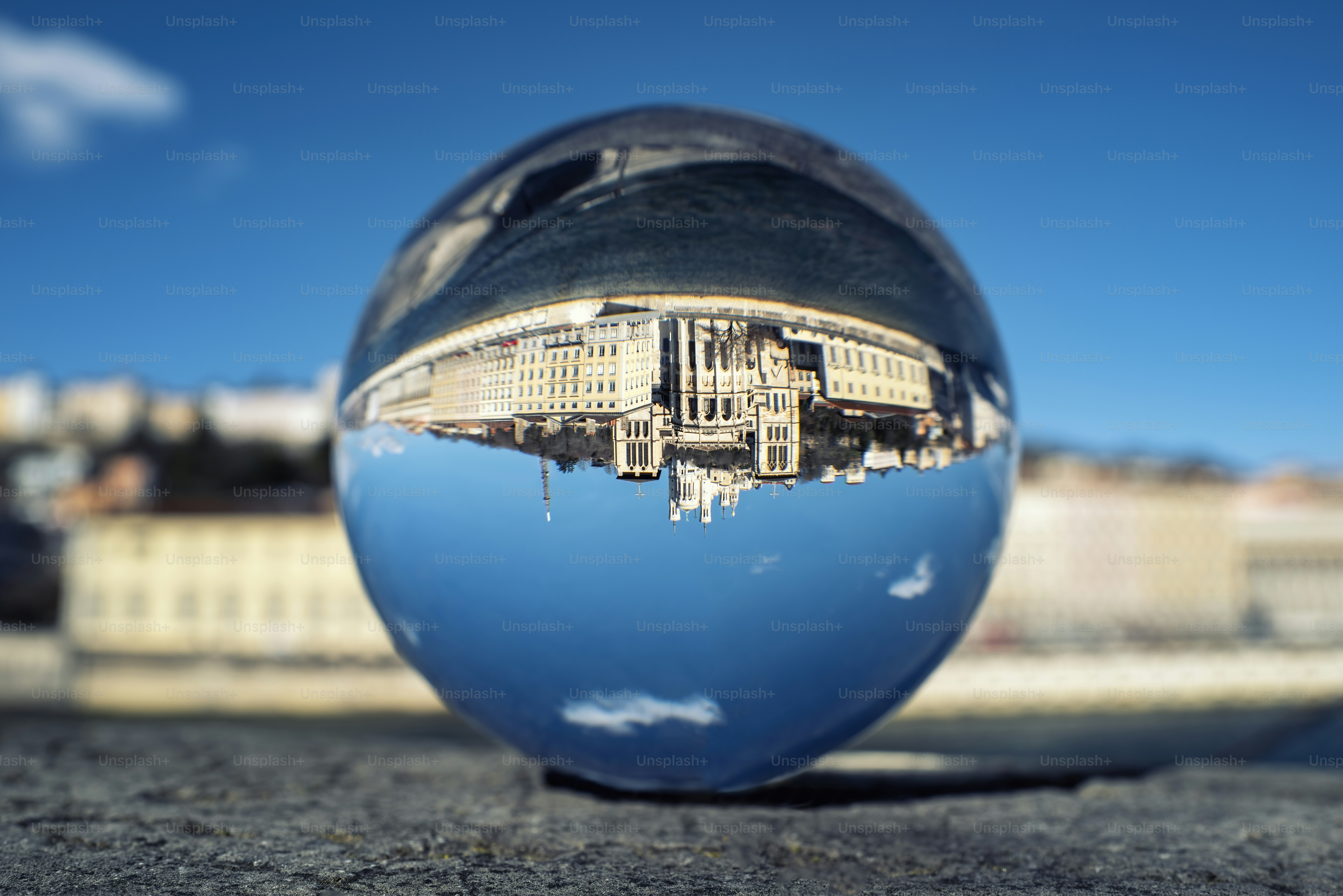 View of Lyon with Saone river through a crystal ball, France.