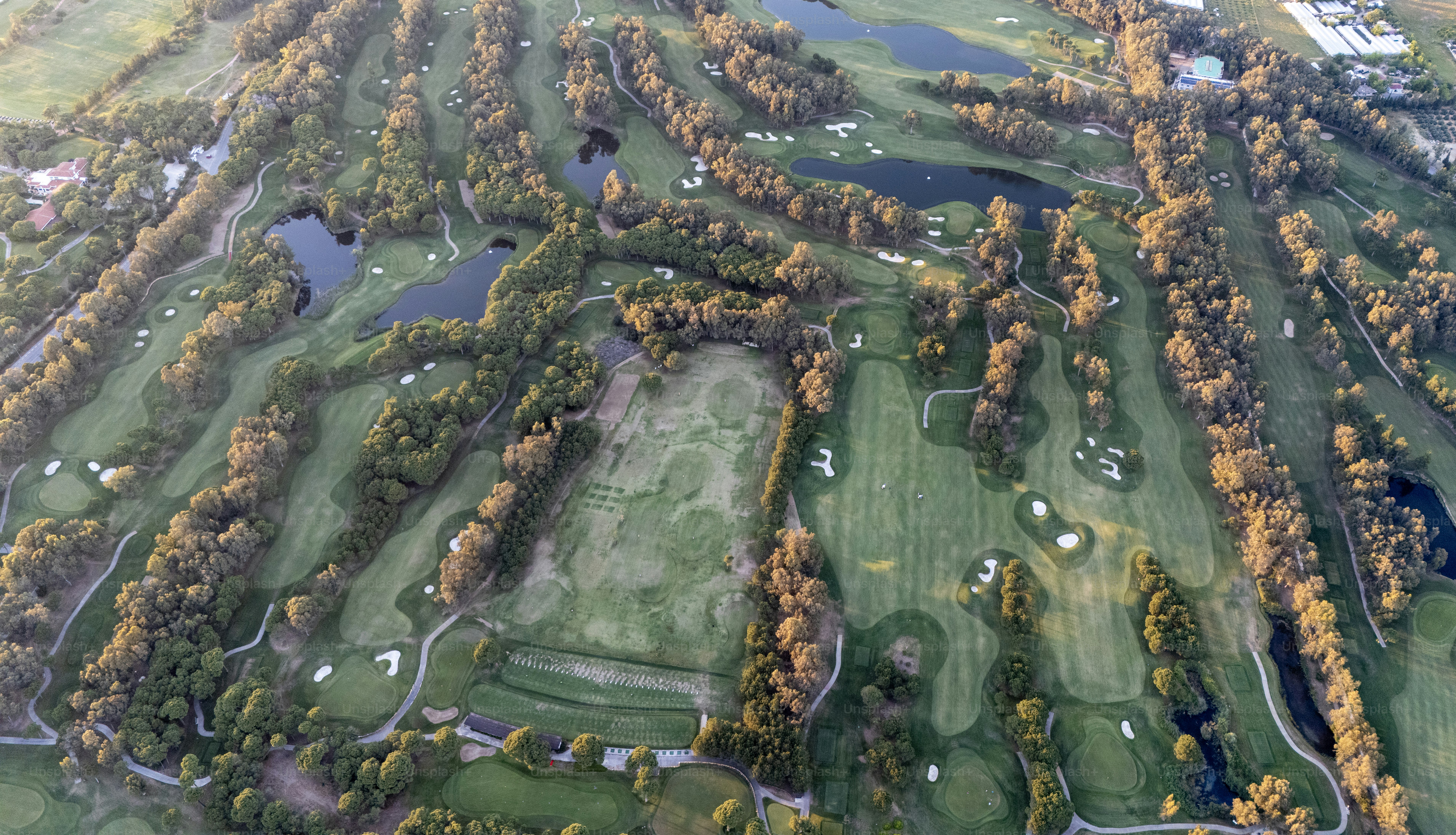 Aerial view of a large Golf Courses and ponds, Drone shot