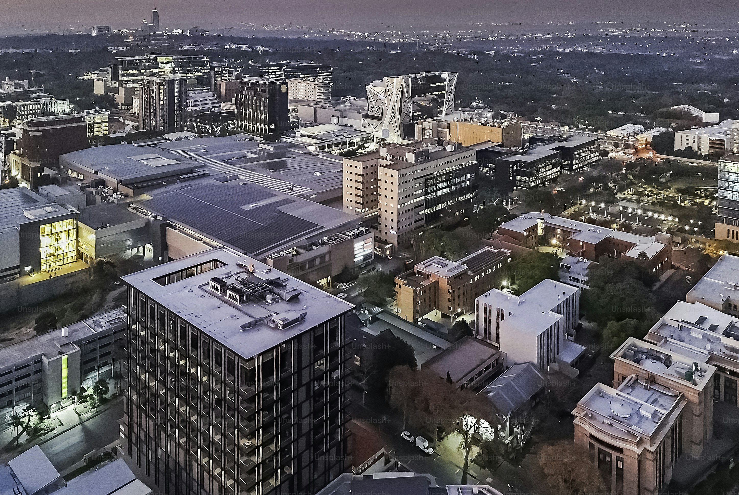 Rosebank seen from above showing the urban area with upmarket apartments, corporate business and Rosebank Mall. Rosebank also features the Gautrain suburban metro station.