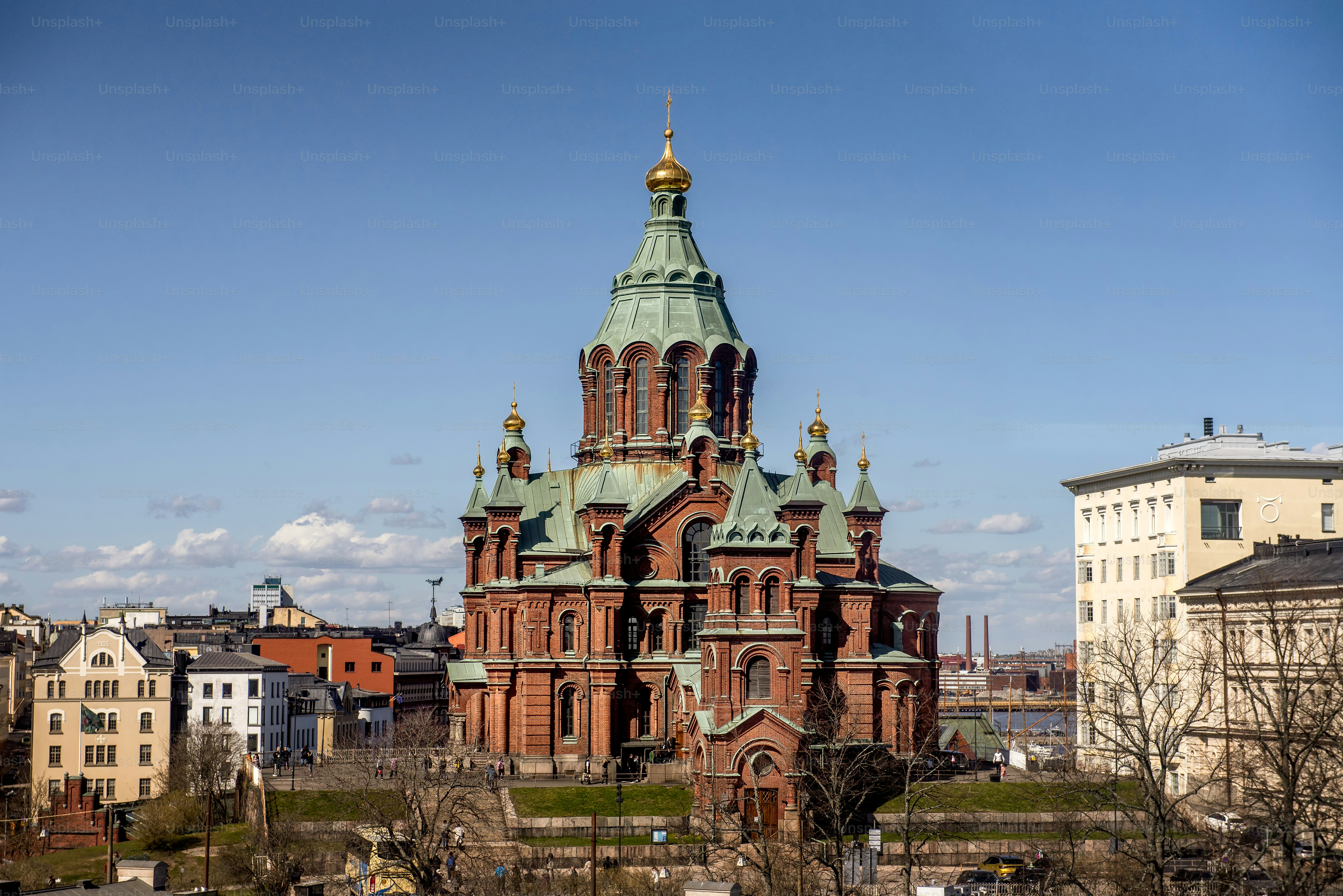 Uspenski Cathedral, Orthodox church in Helsinki, on a hill at sunny day. Red Church - Tourist destination In Finnish Capital, Finland.