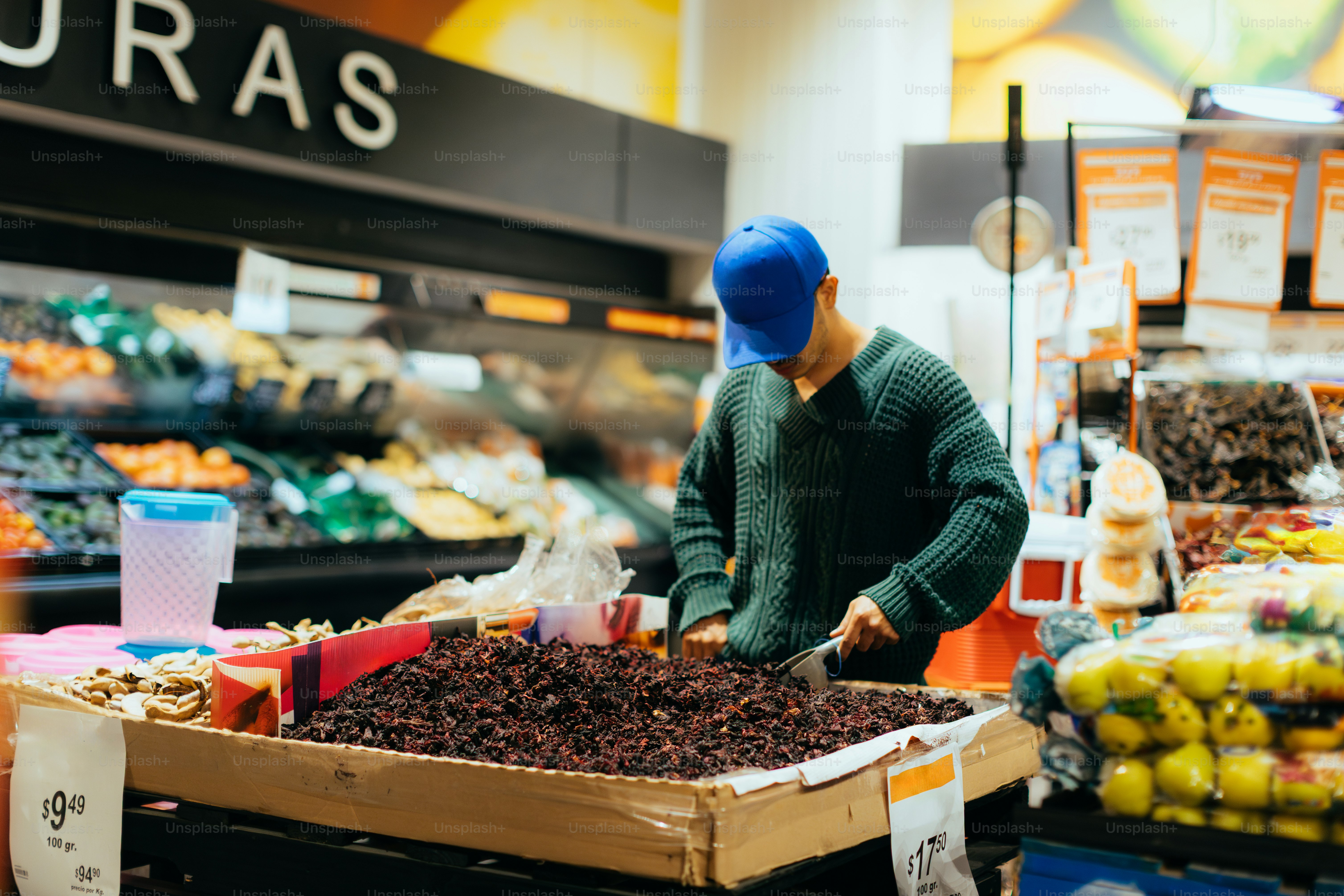 A store employee working at the grocery store.