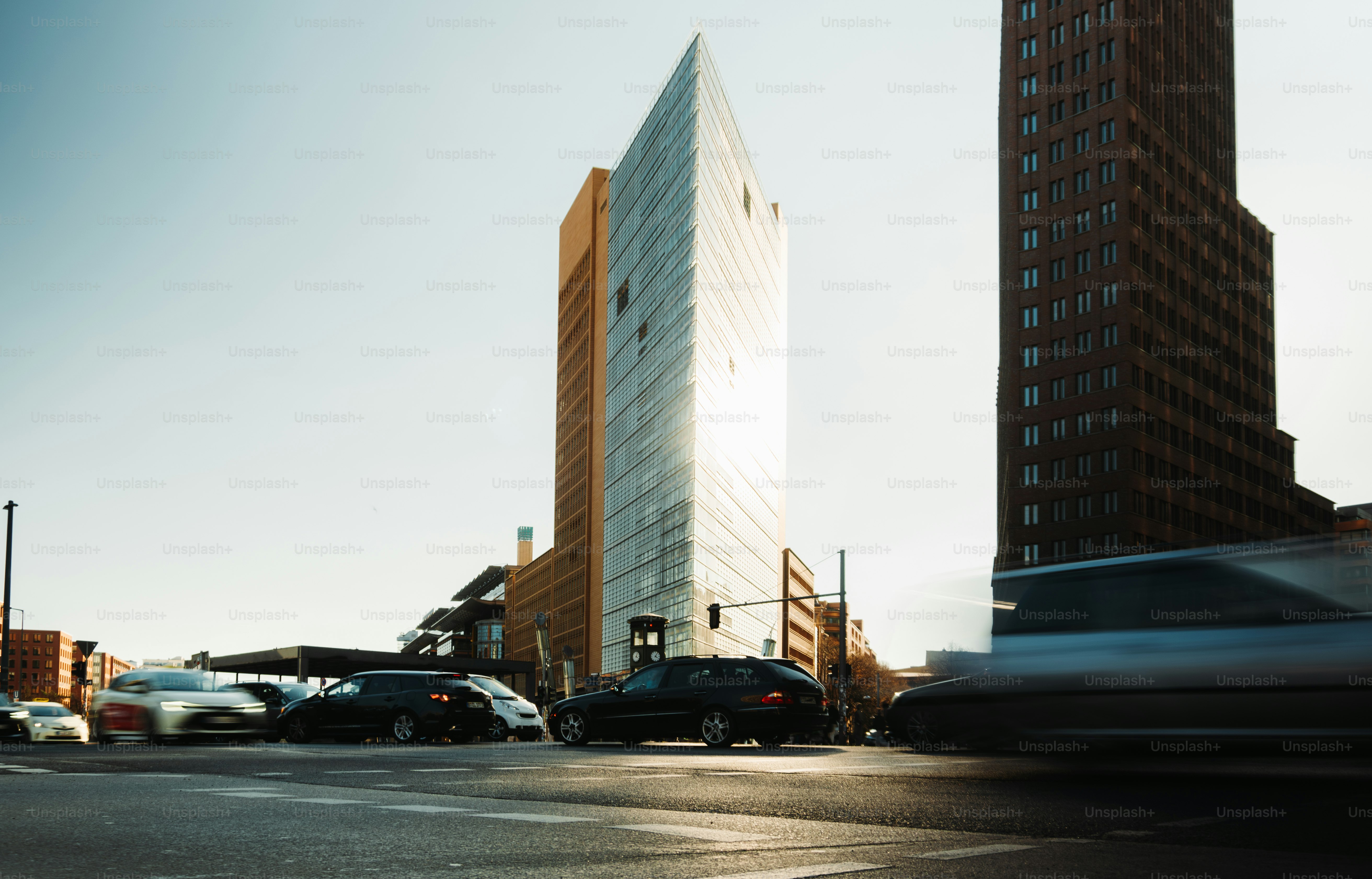 Modern buildings and traffic on a sunny day.