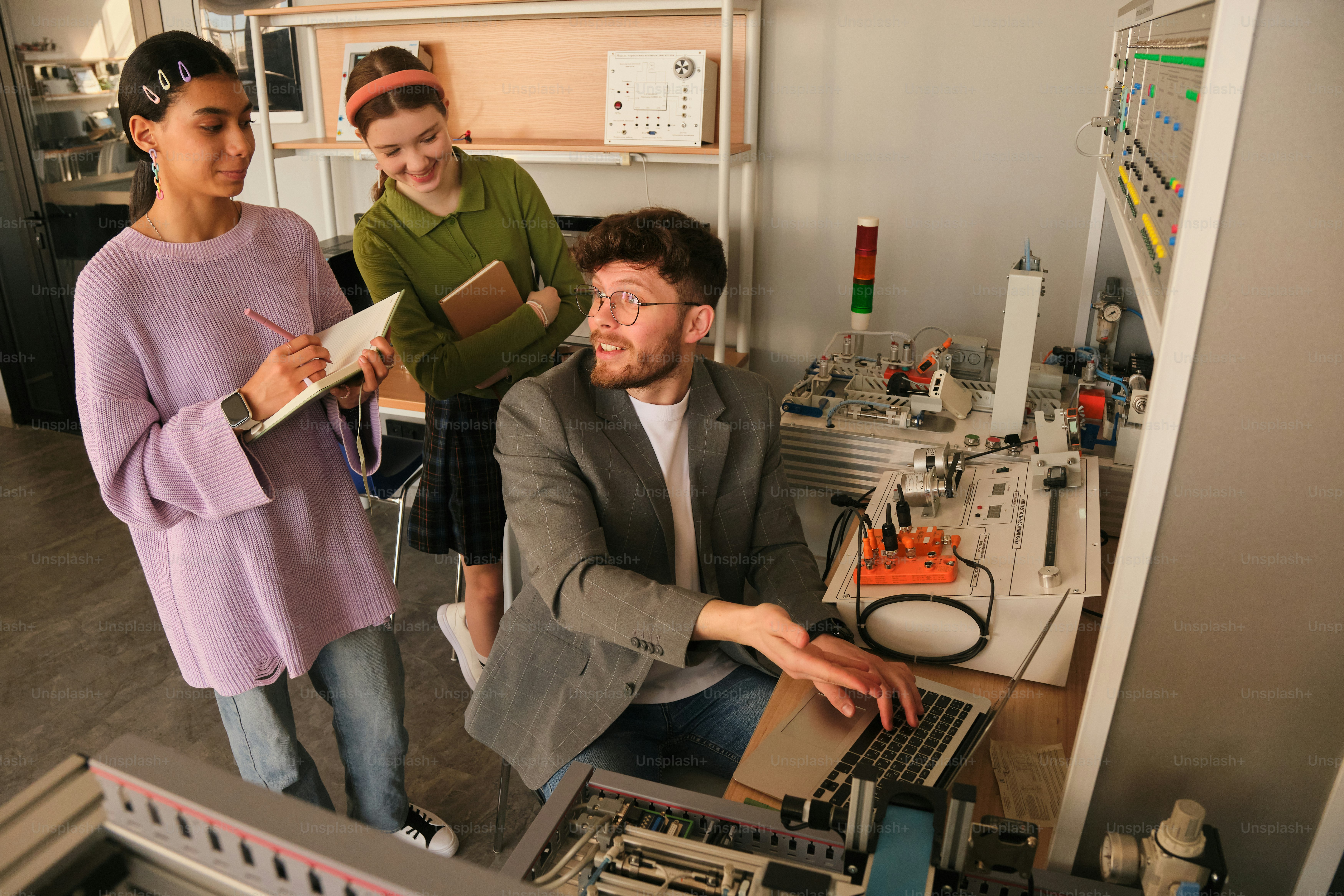 Students are working on a robotics project together. photo – Technology ...