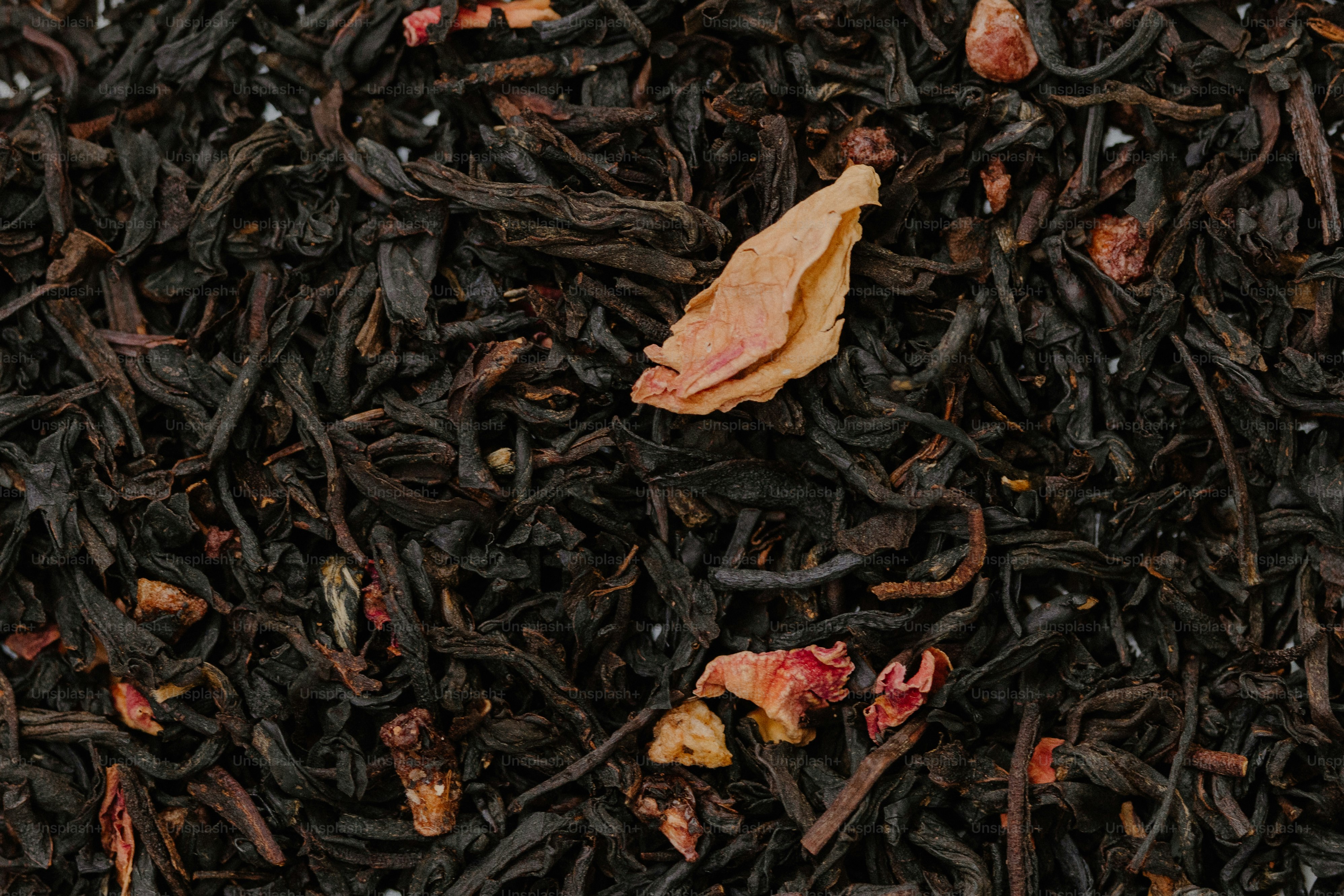 Loose leaf tea with fruit pieces.