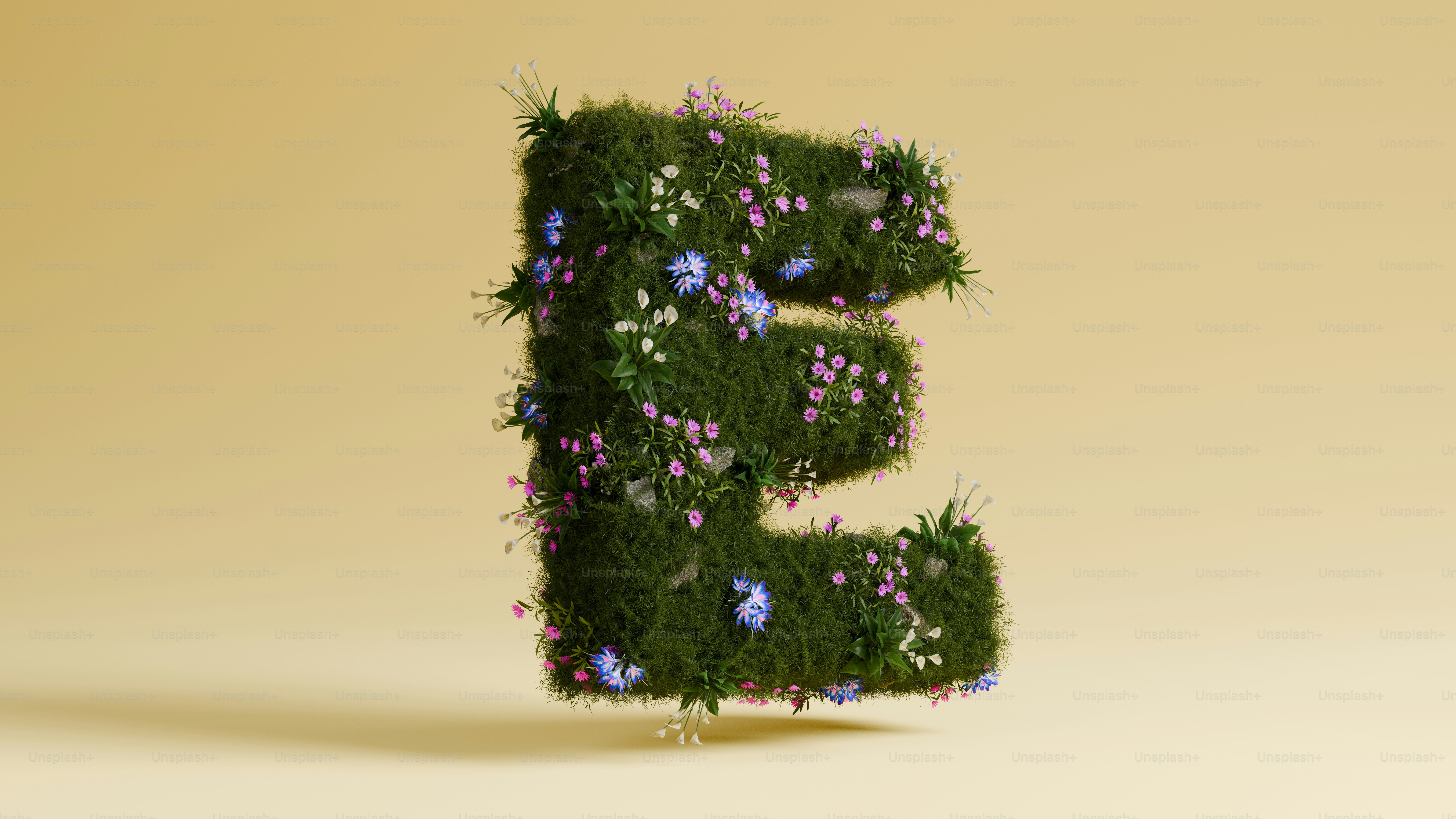 Der Buchstabe "e" setzt sich aus Gras und Blumen zusammen.