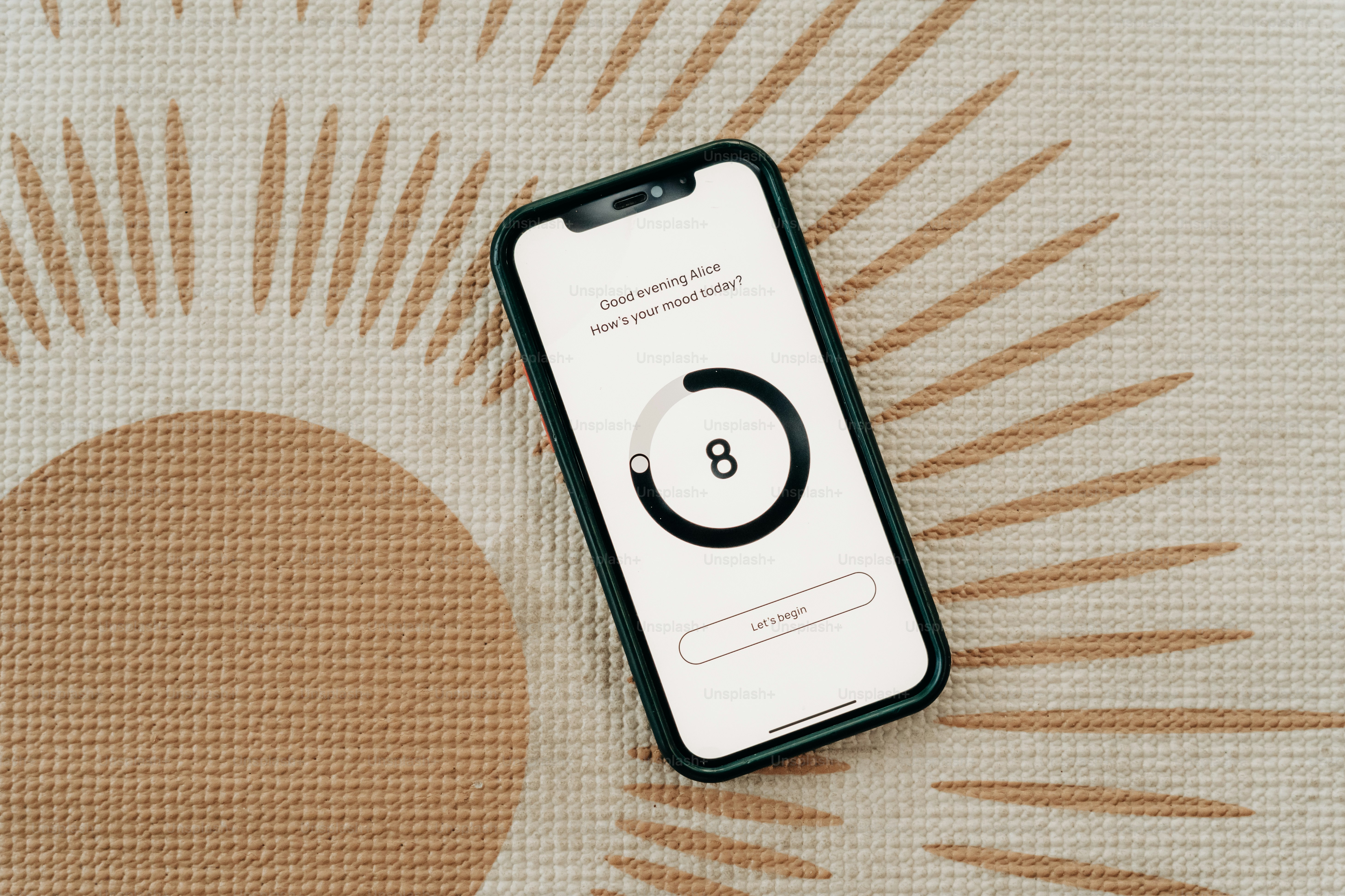A phone shows an exercise app