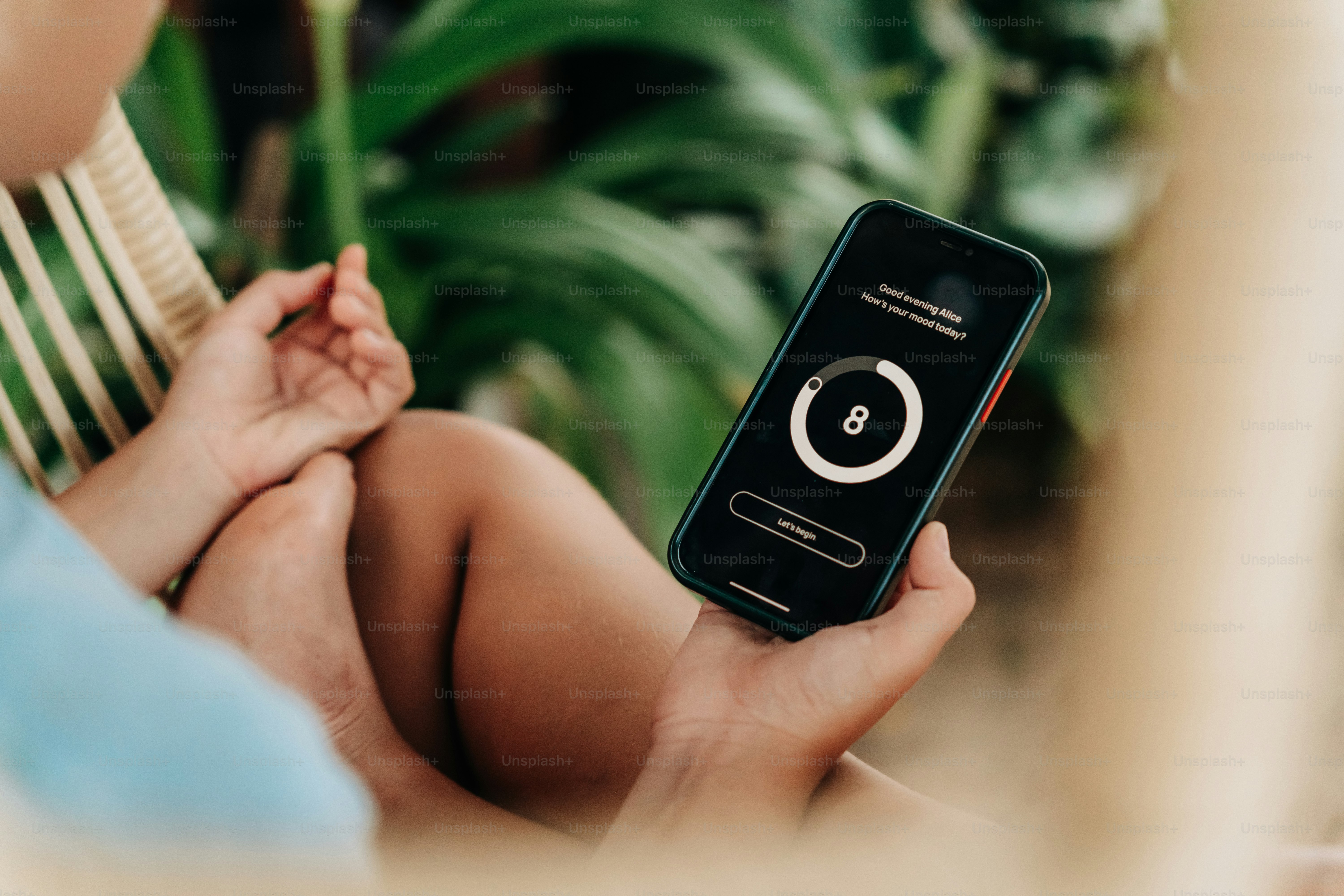 Someone is using a phone with an app on it.