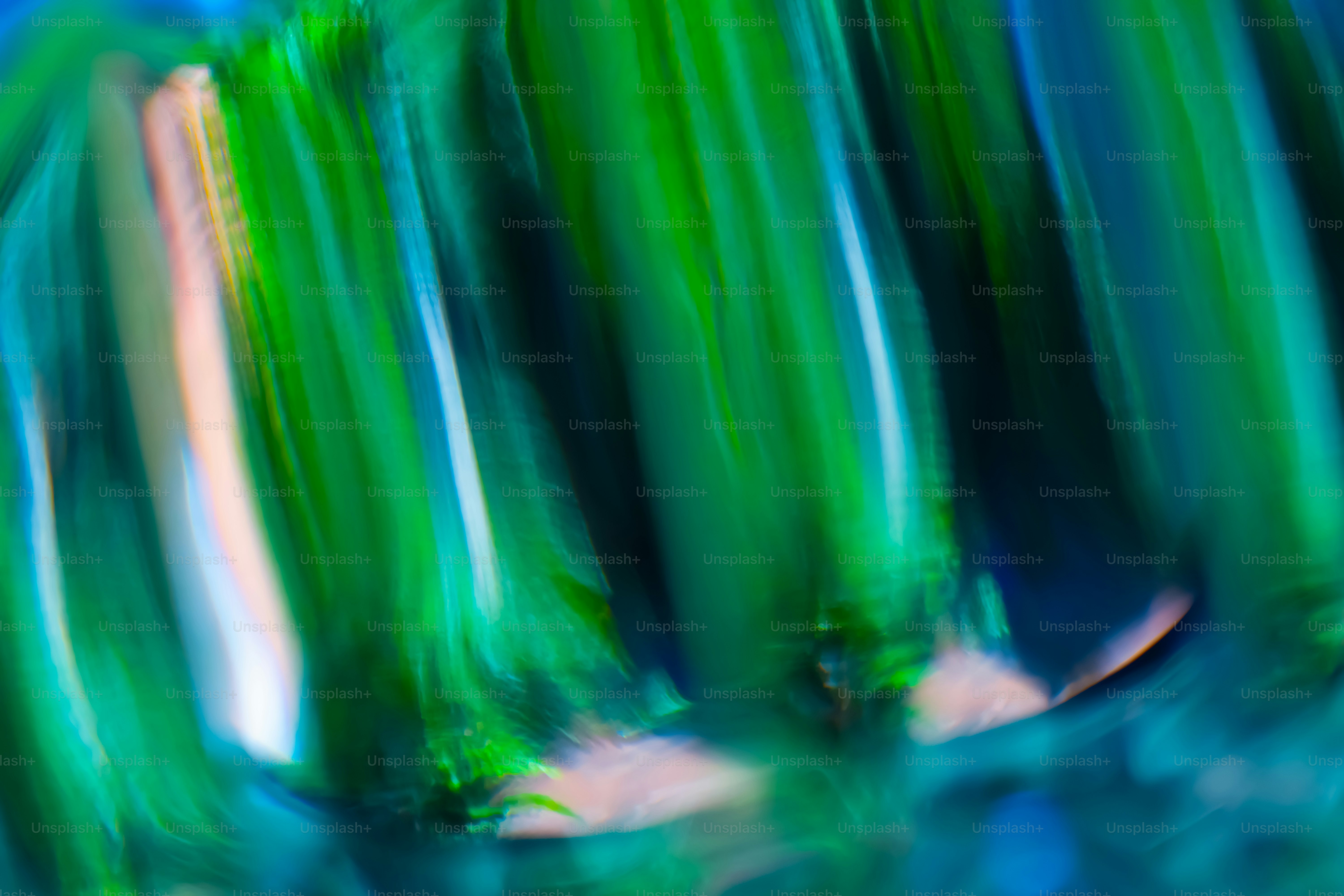 Abstract view of blurry green and blue textures.