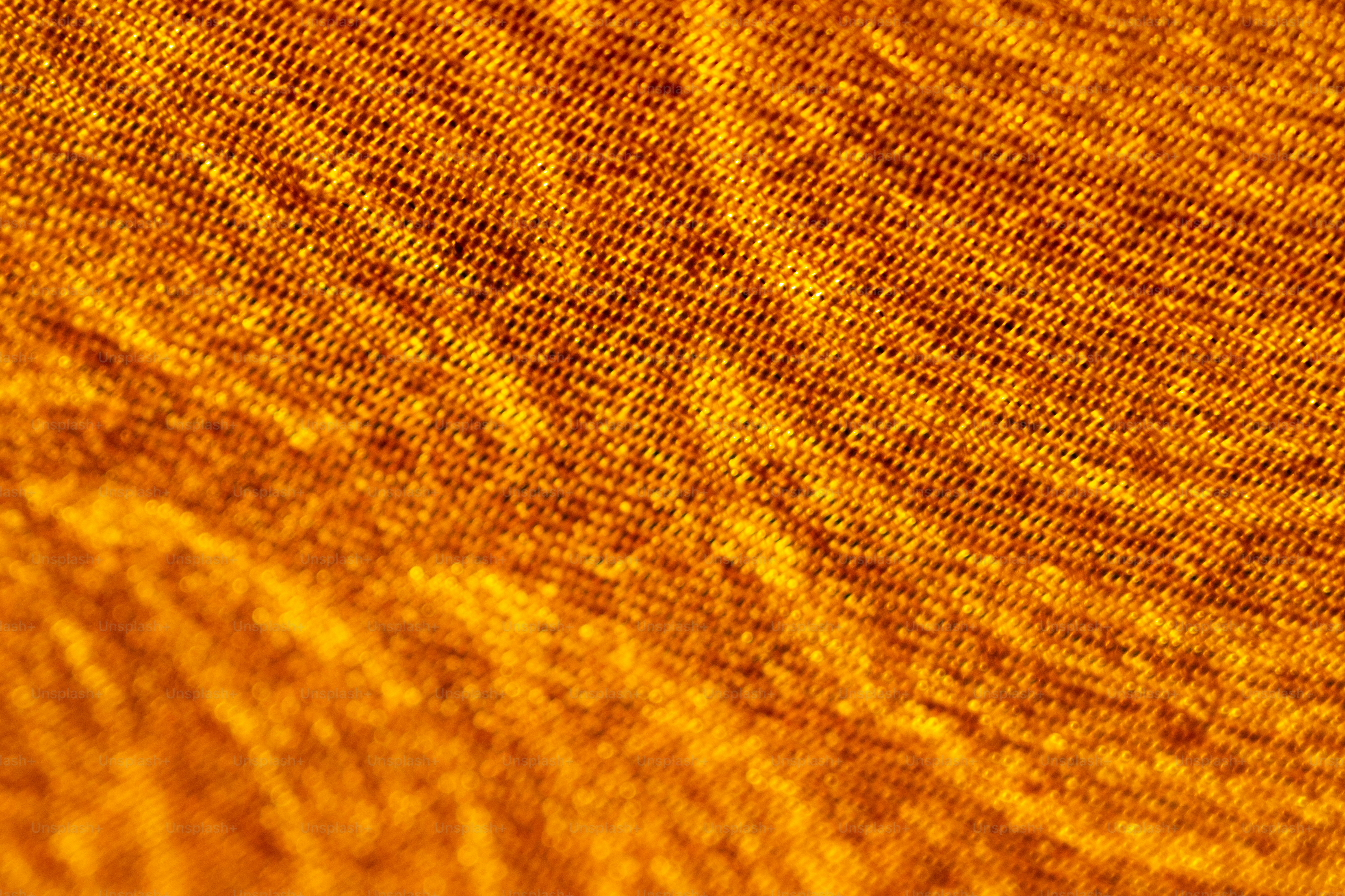 Close-up of textured orange fabric.