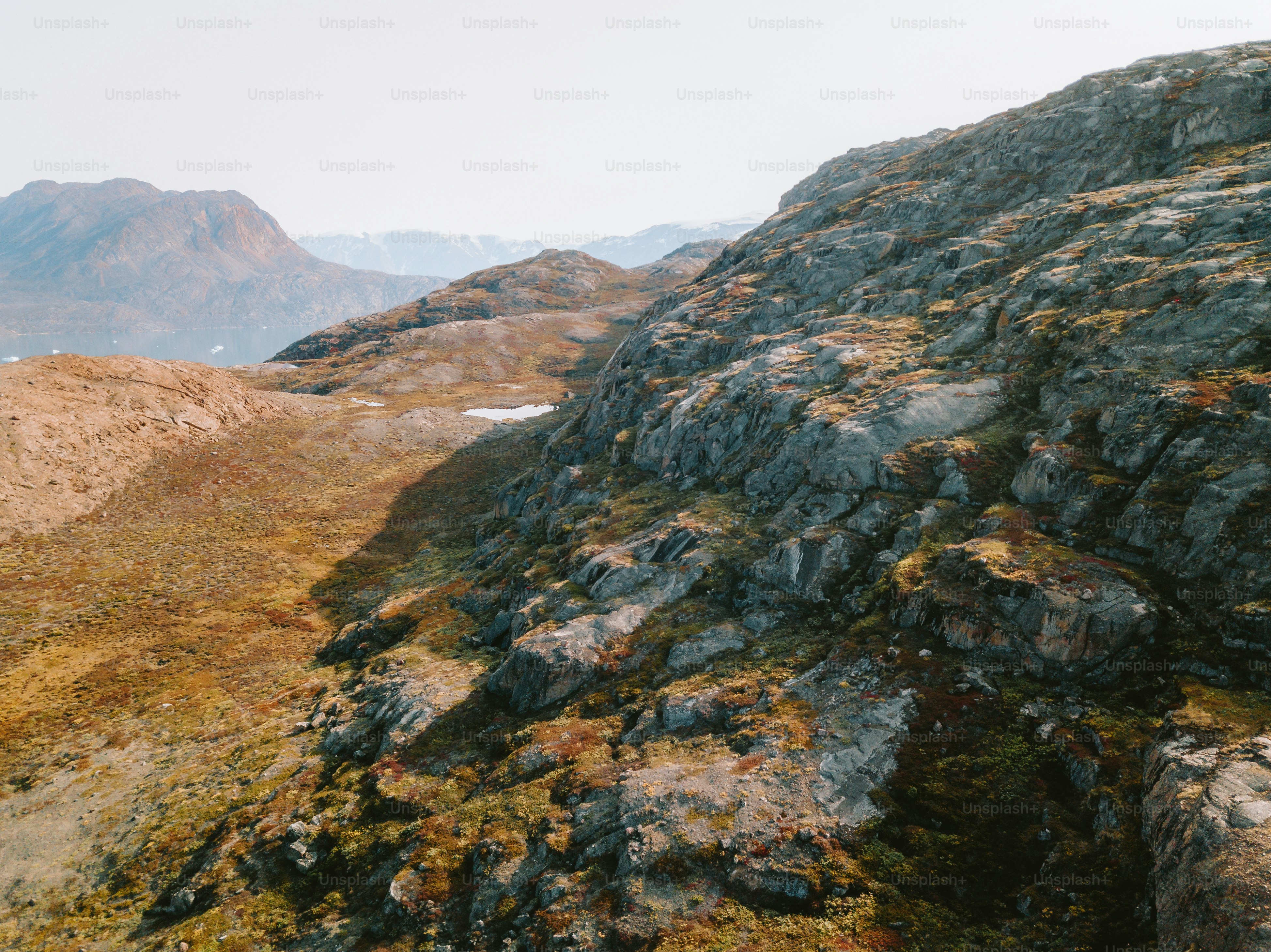 Rocky mountain landscape with some vegetation.