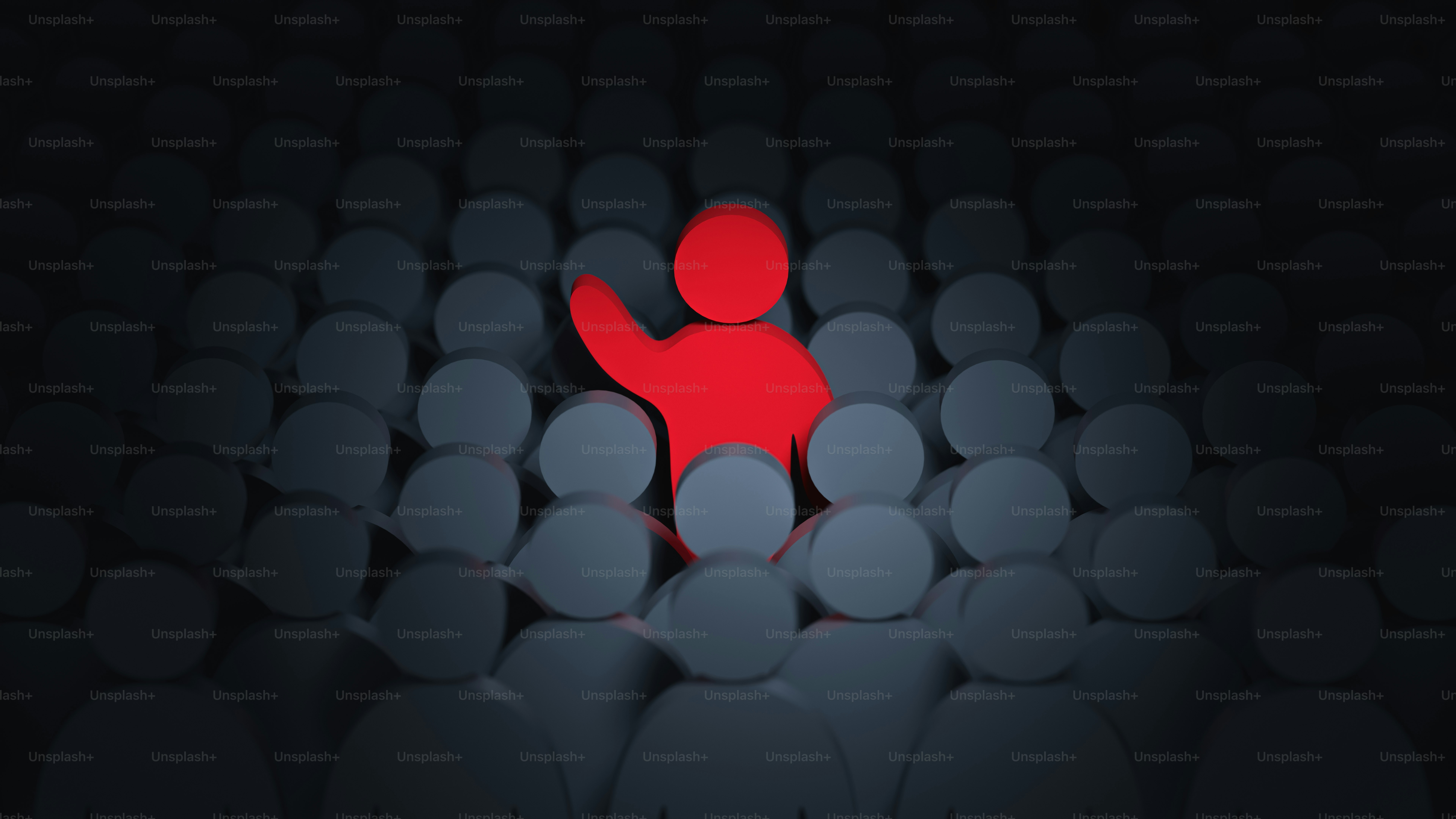 A bright red figure stands out in the crowd.