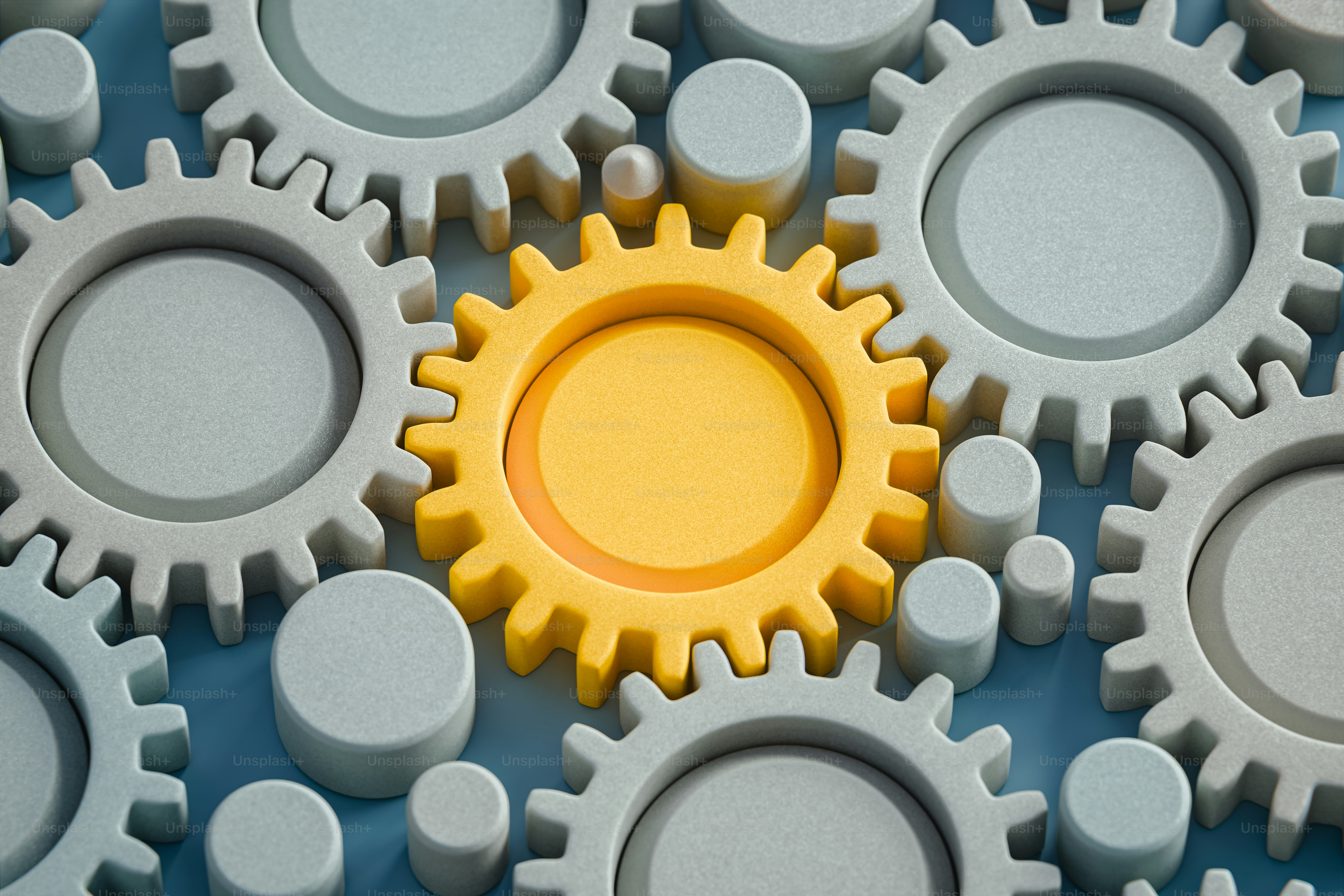 Uma engrenagem dourada se destaca entre as cinzas.