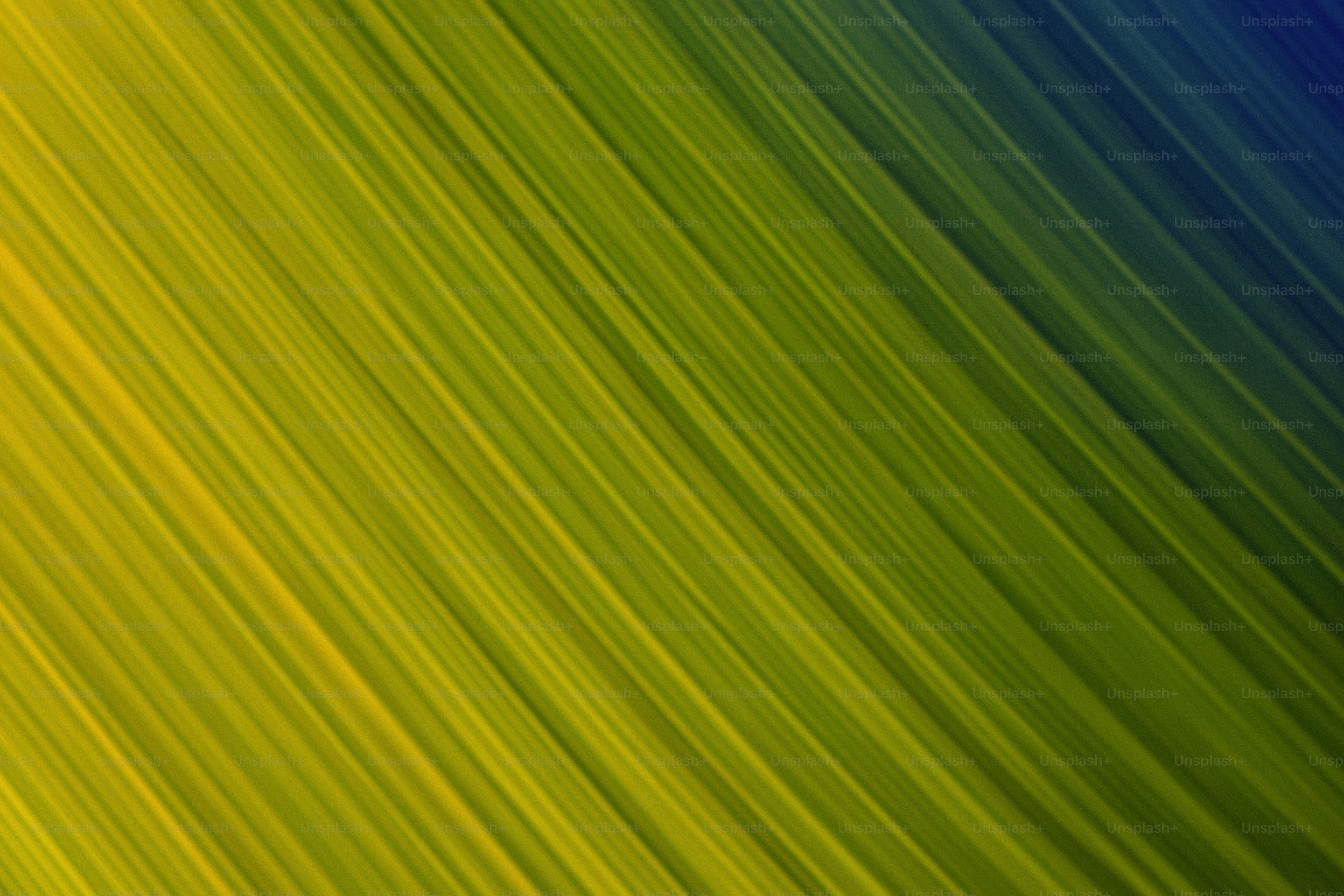 Linee diagonali di giallo, verde e blu.