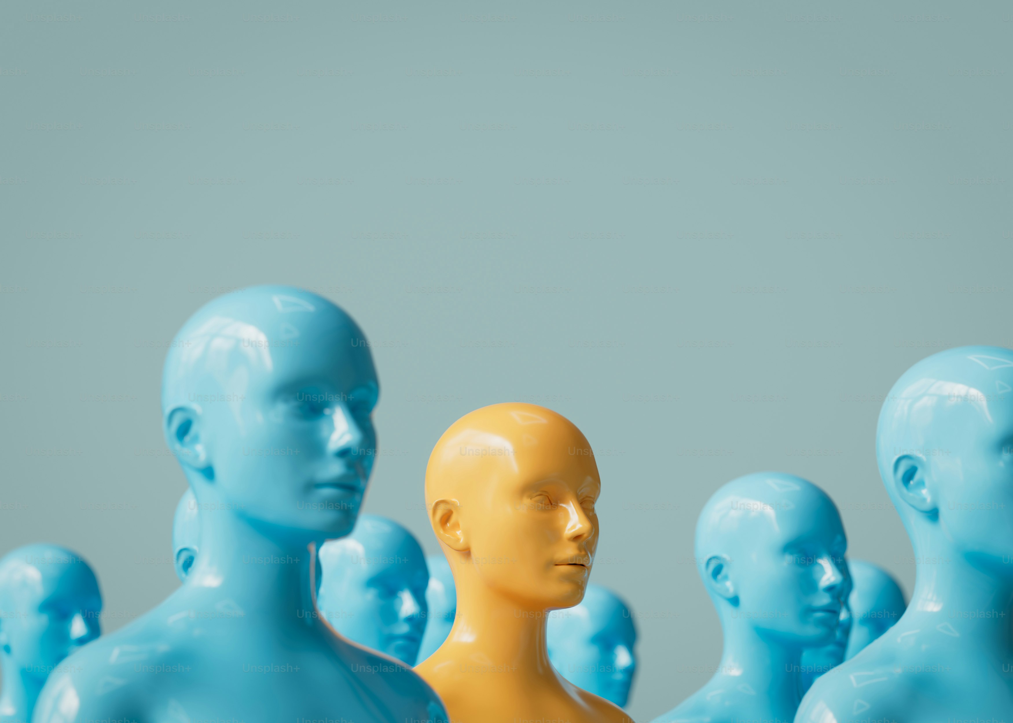 A yellow head stands out in a blue crowd.