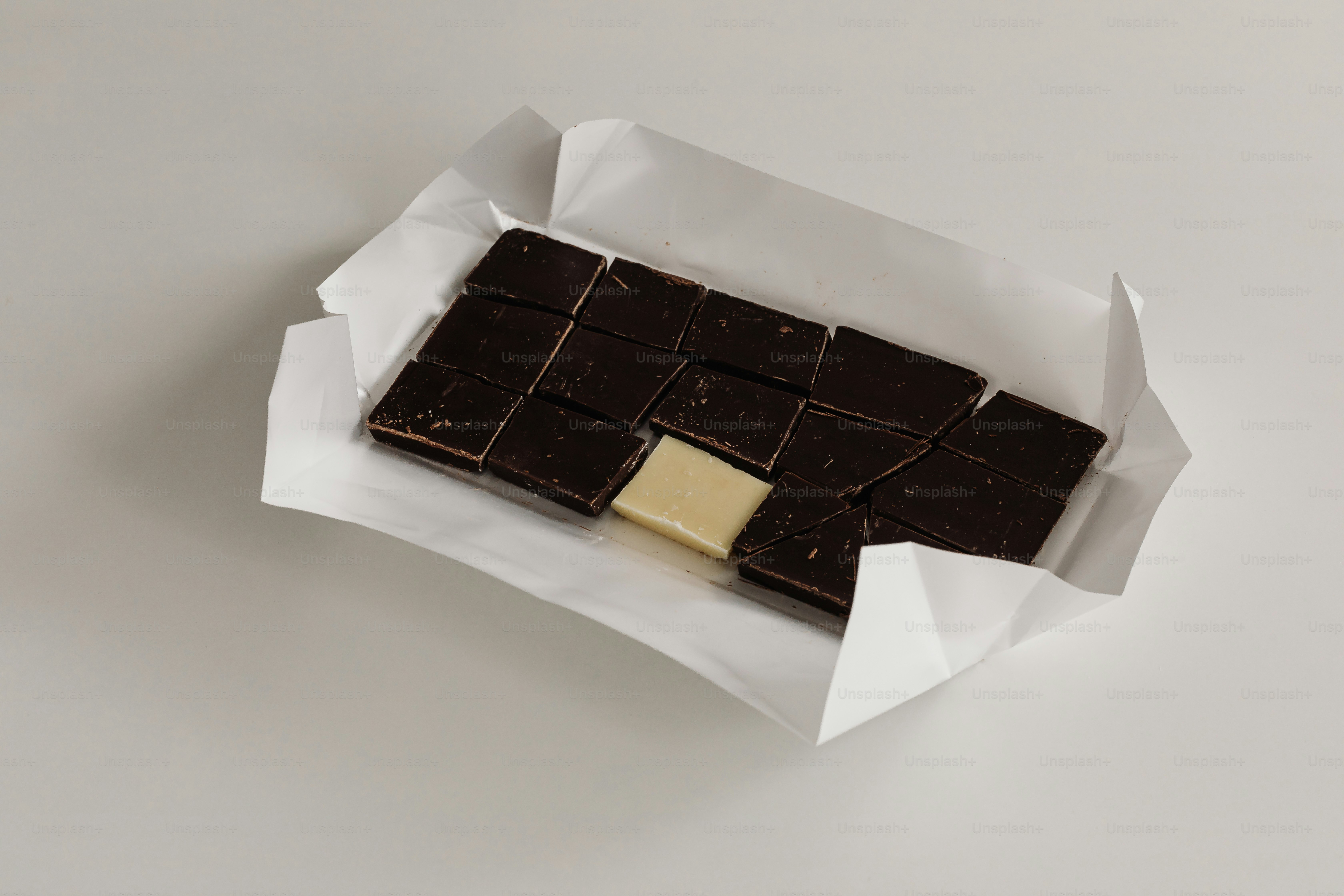 Chocolate bar with a missing white chocolate square.