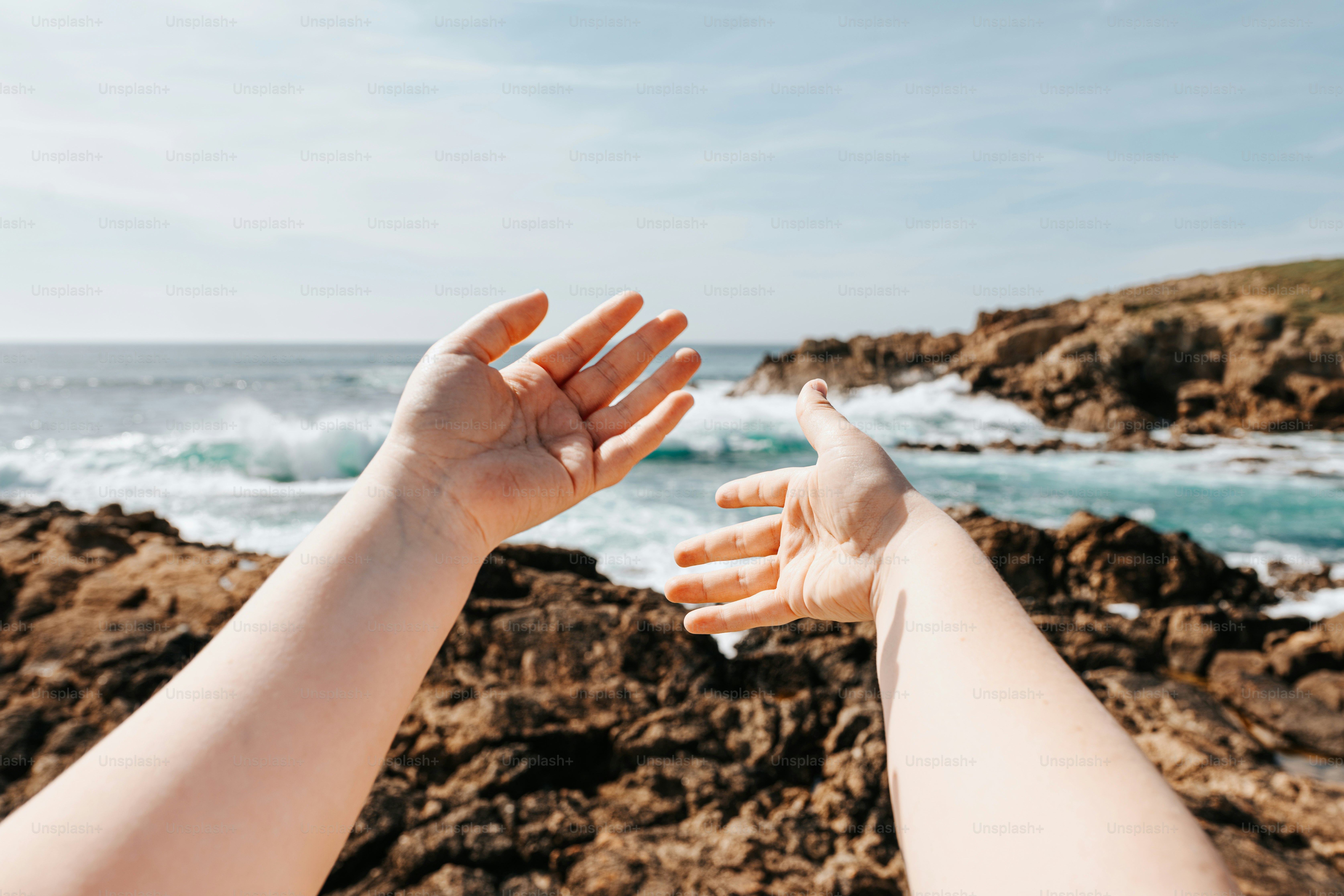 Reaching out towards the beautiful ocean.