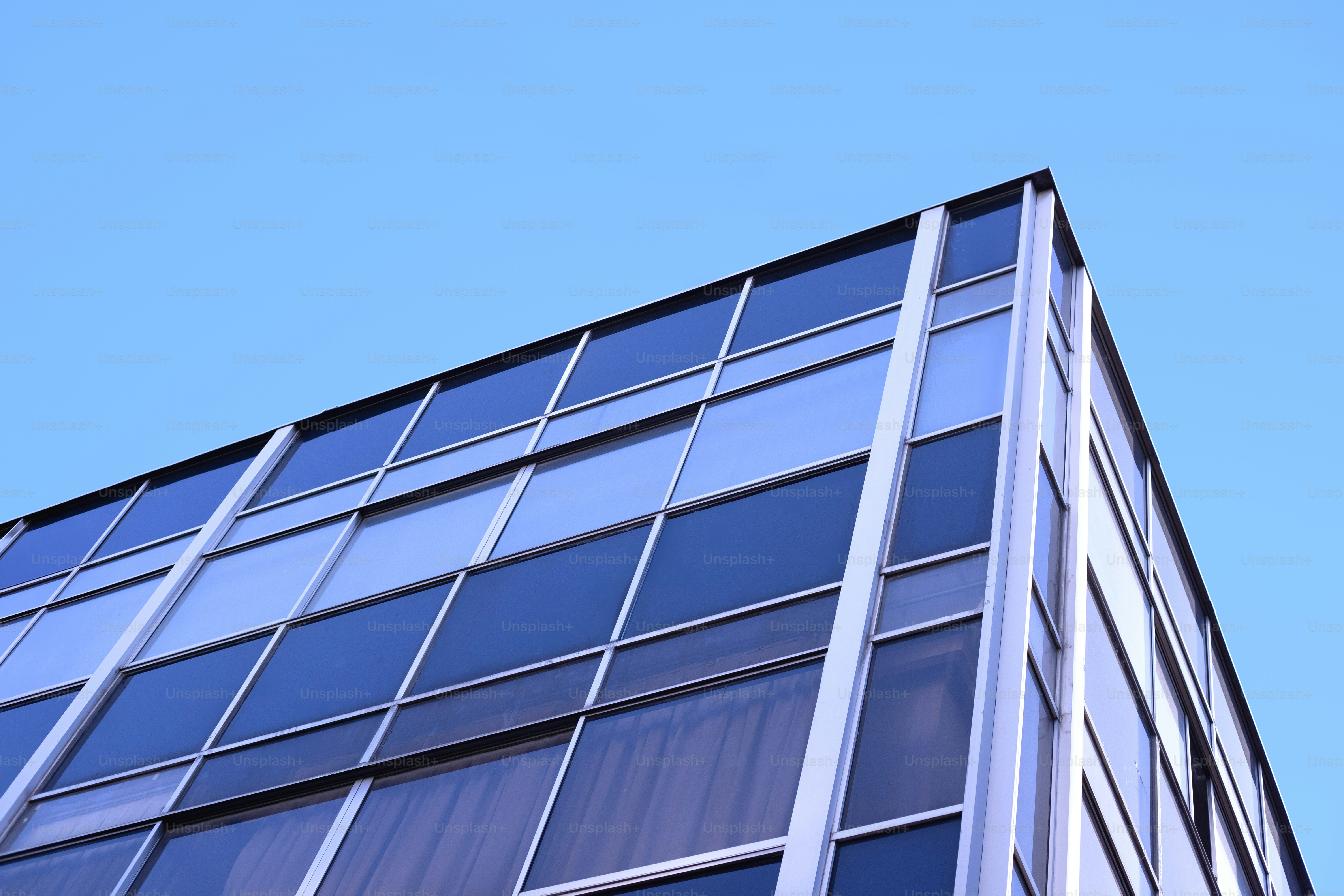 A modern building with a blue sky.