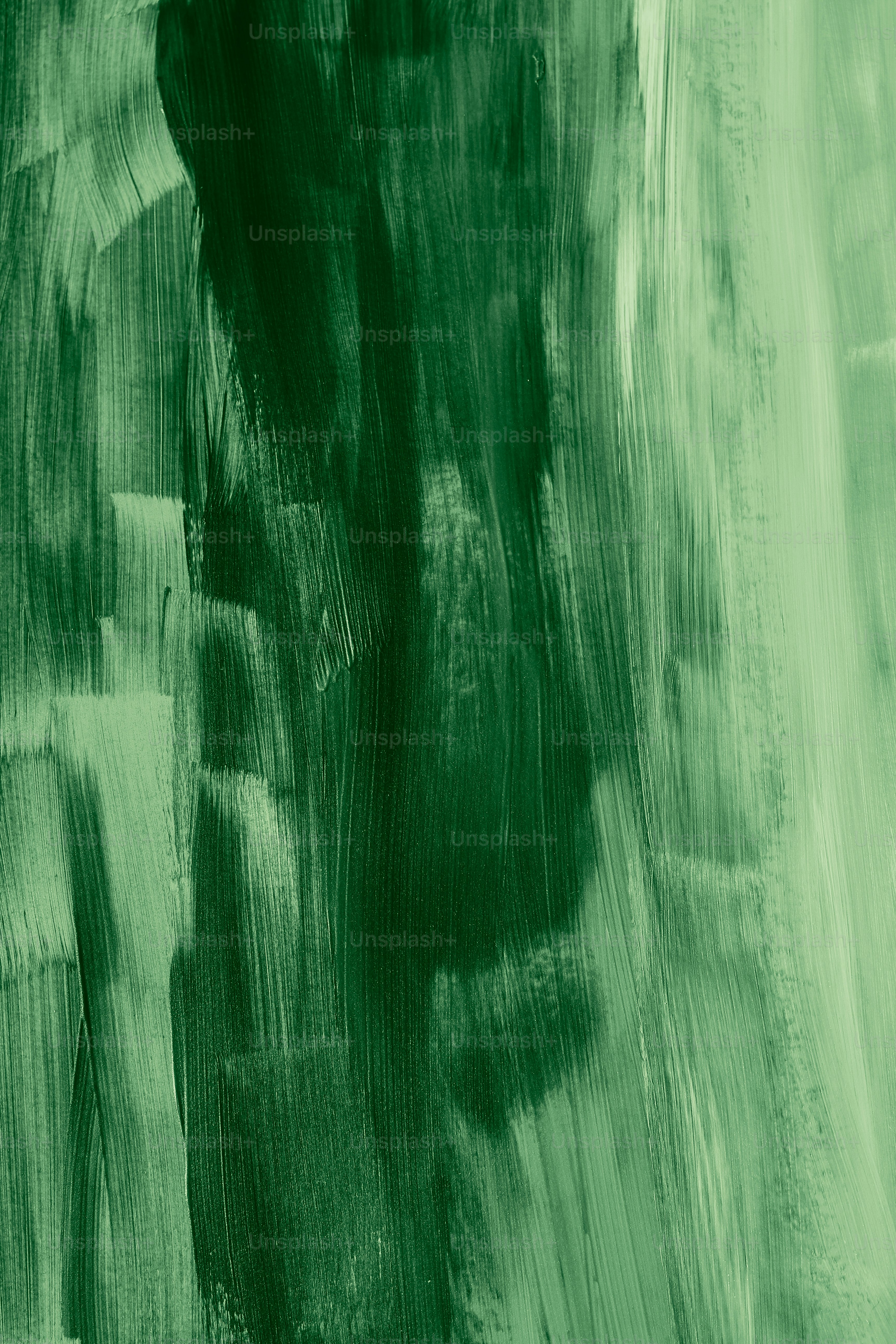 Abstract green brushstrokes create texture.