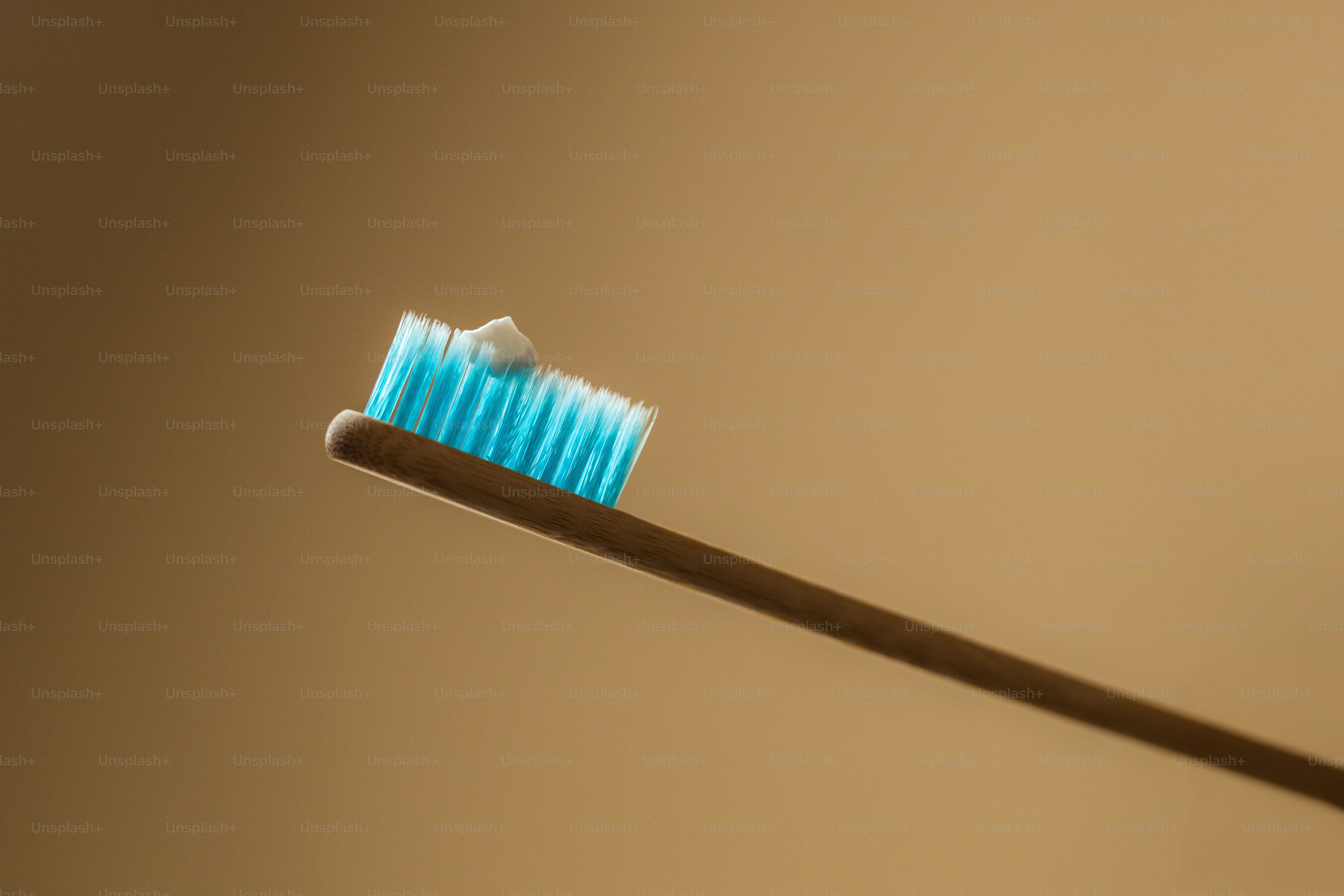 Toothpaste is on the toothbrush, ready to clean.
