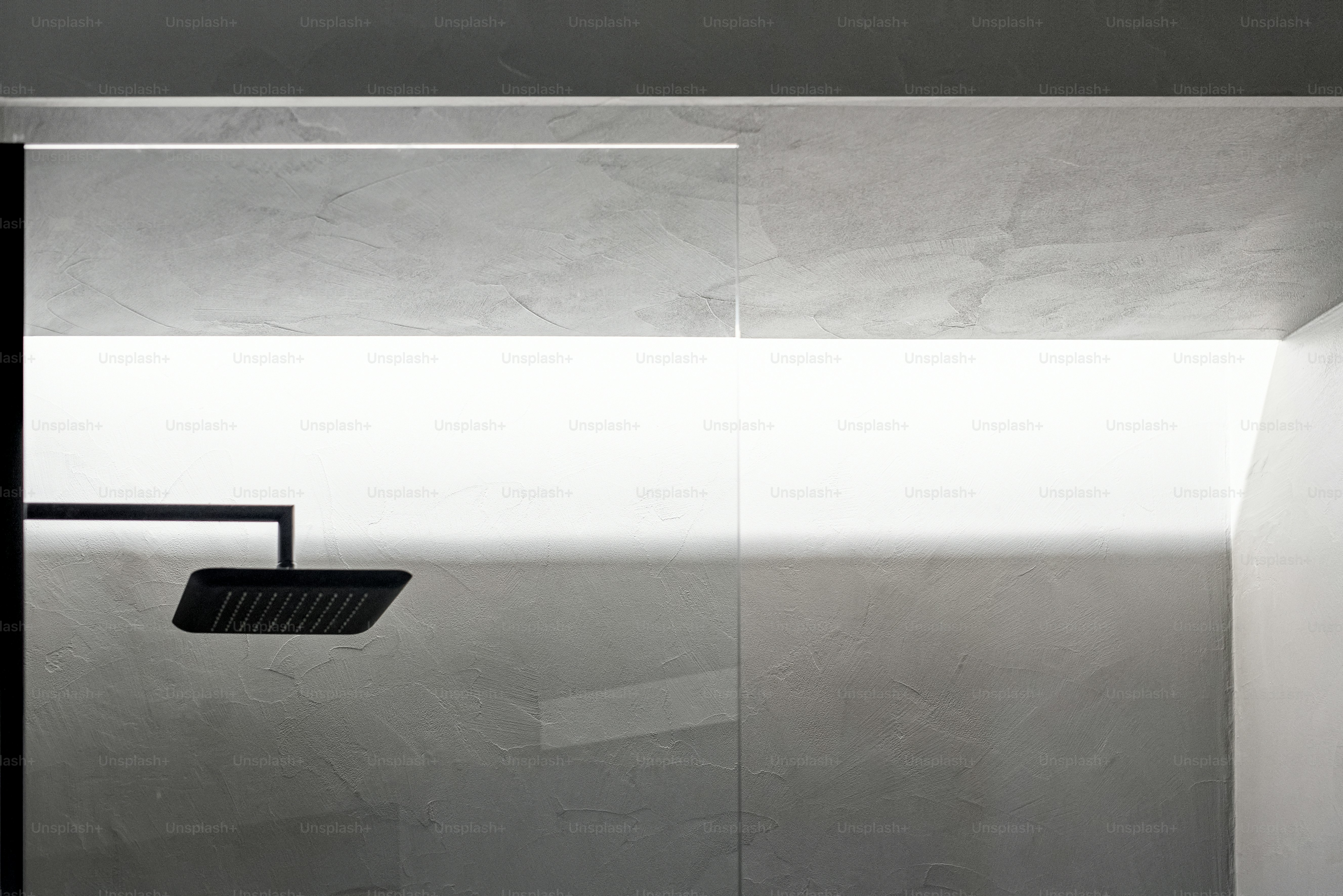 A modern bathroom with a black shower head. photo – Interior design ...