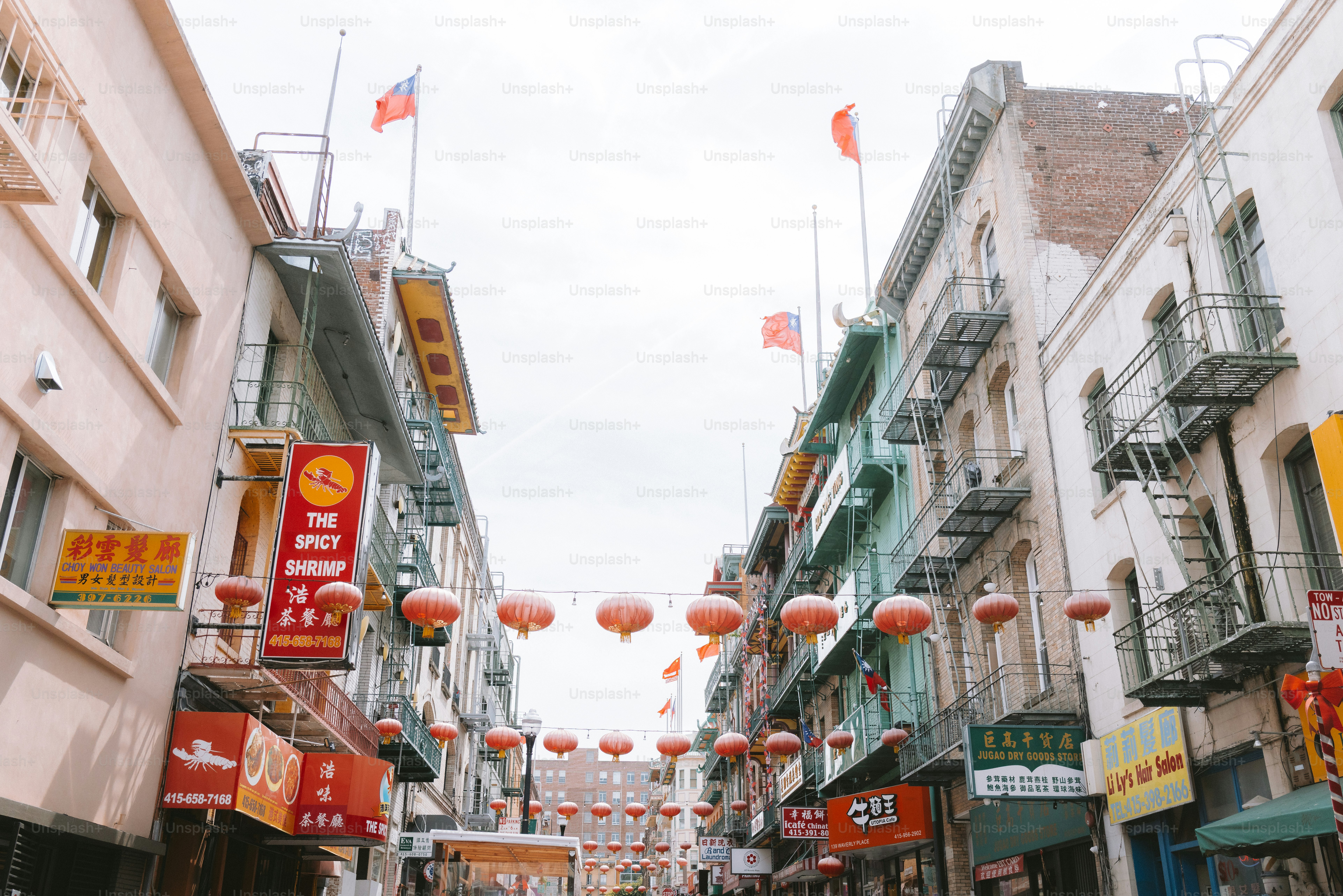Chinatown street scene with hanging lanterns.
