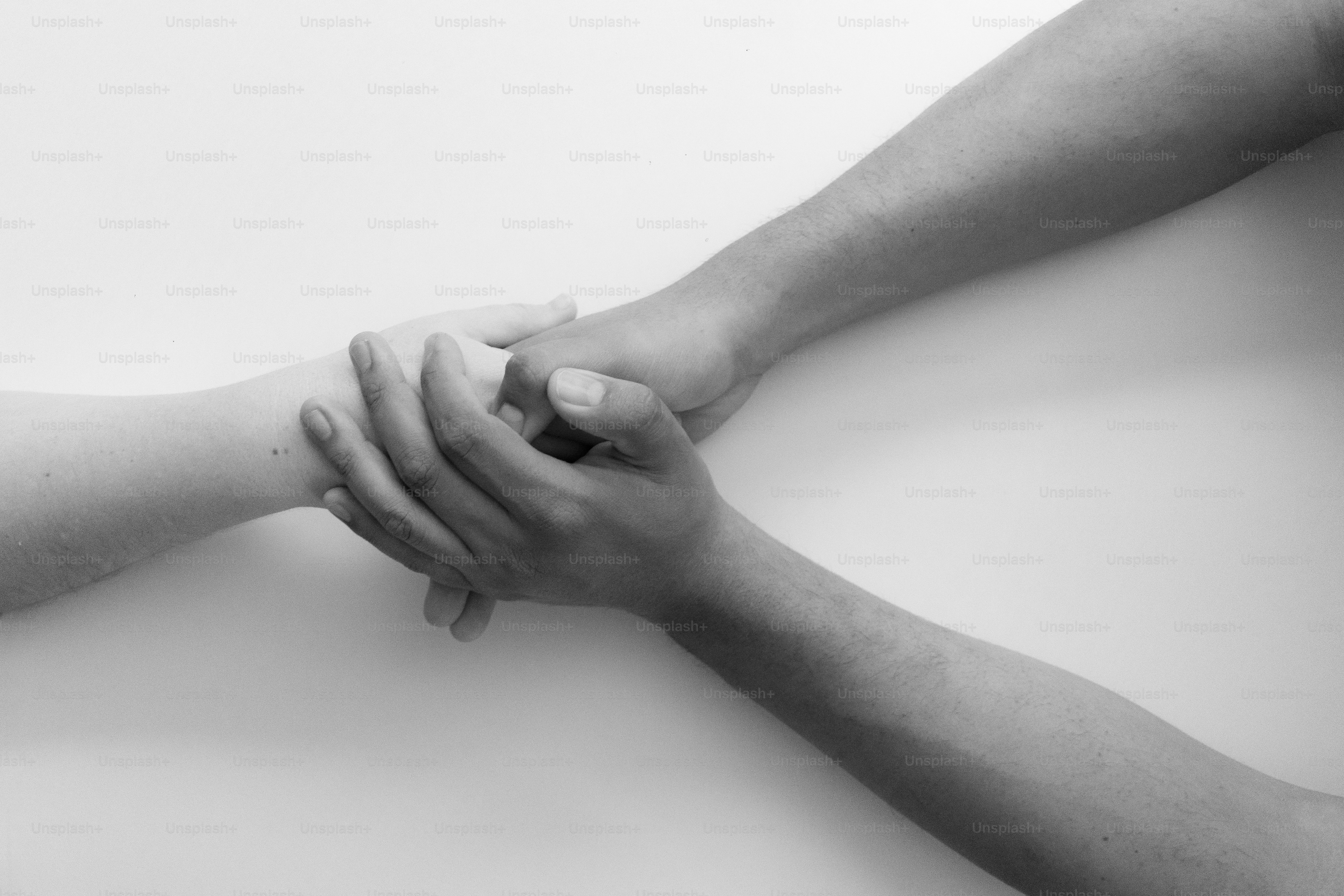 Hands holding each other for support.