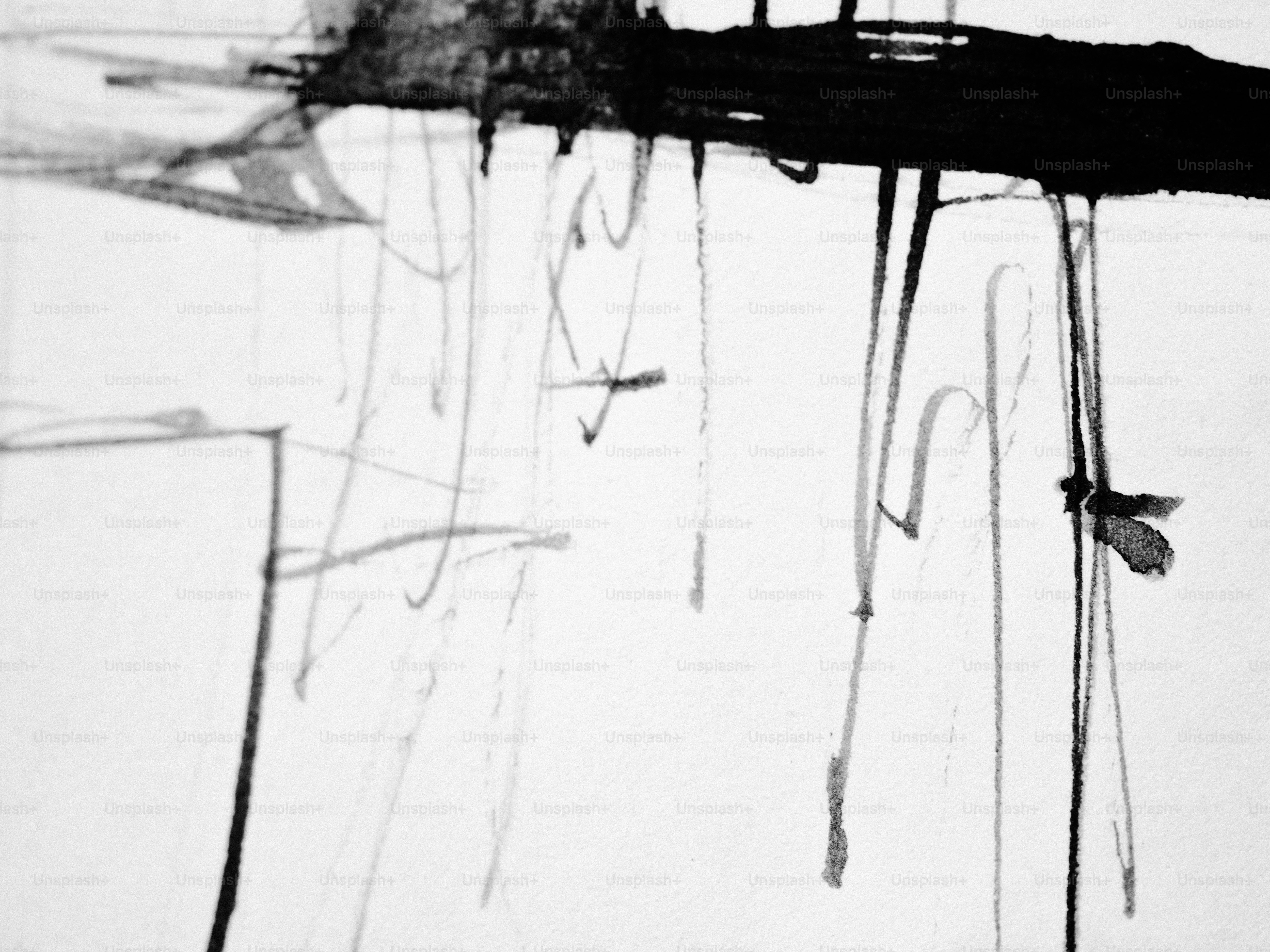 Arte abstracto en blanco y negro con goteos.