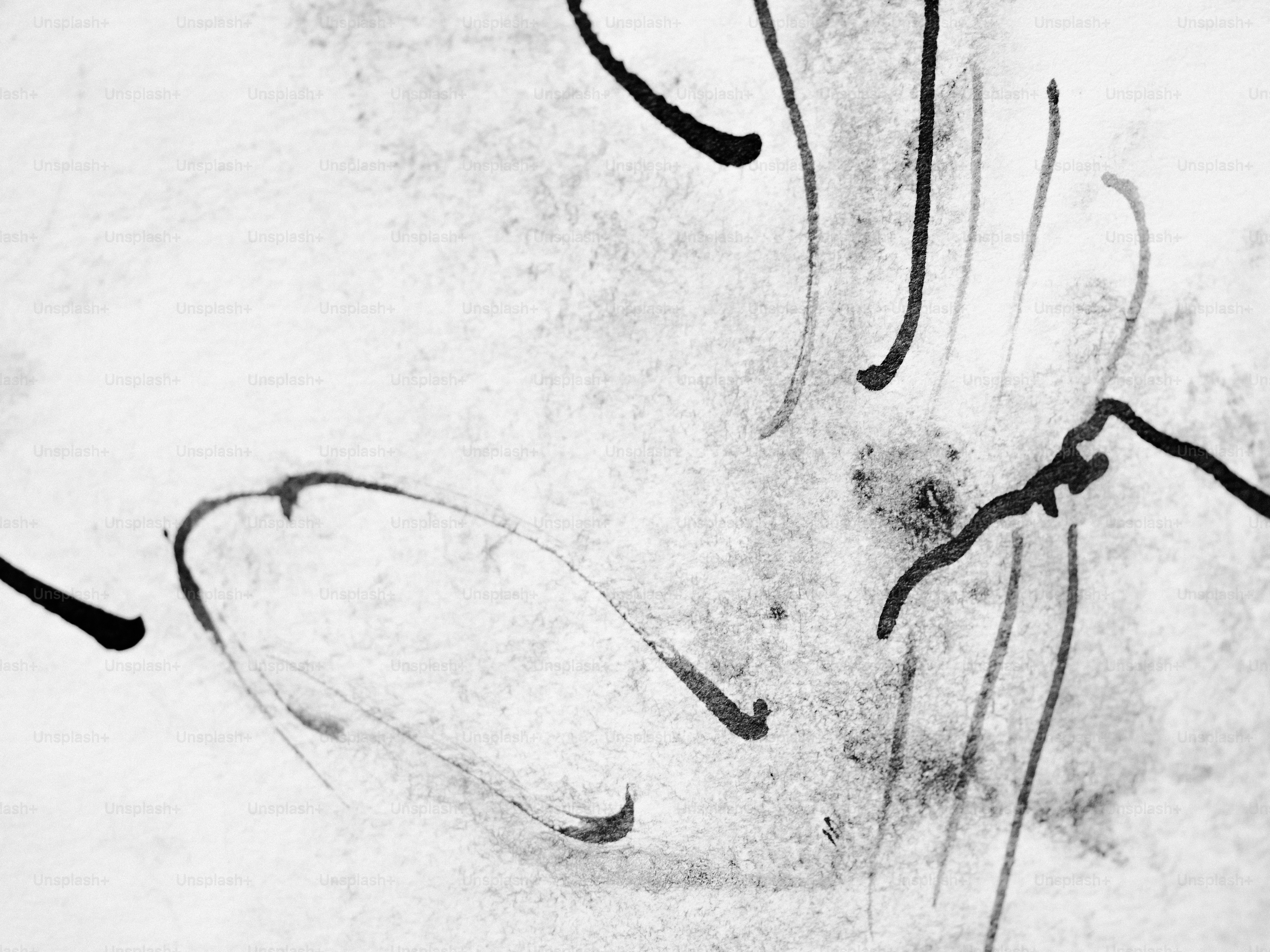 Traços de tinta abstratos e manchas em um fundo branco