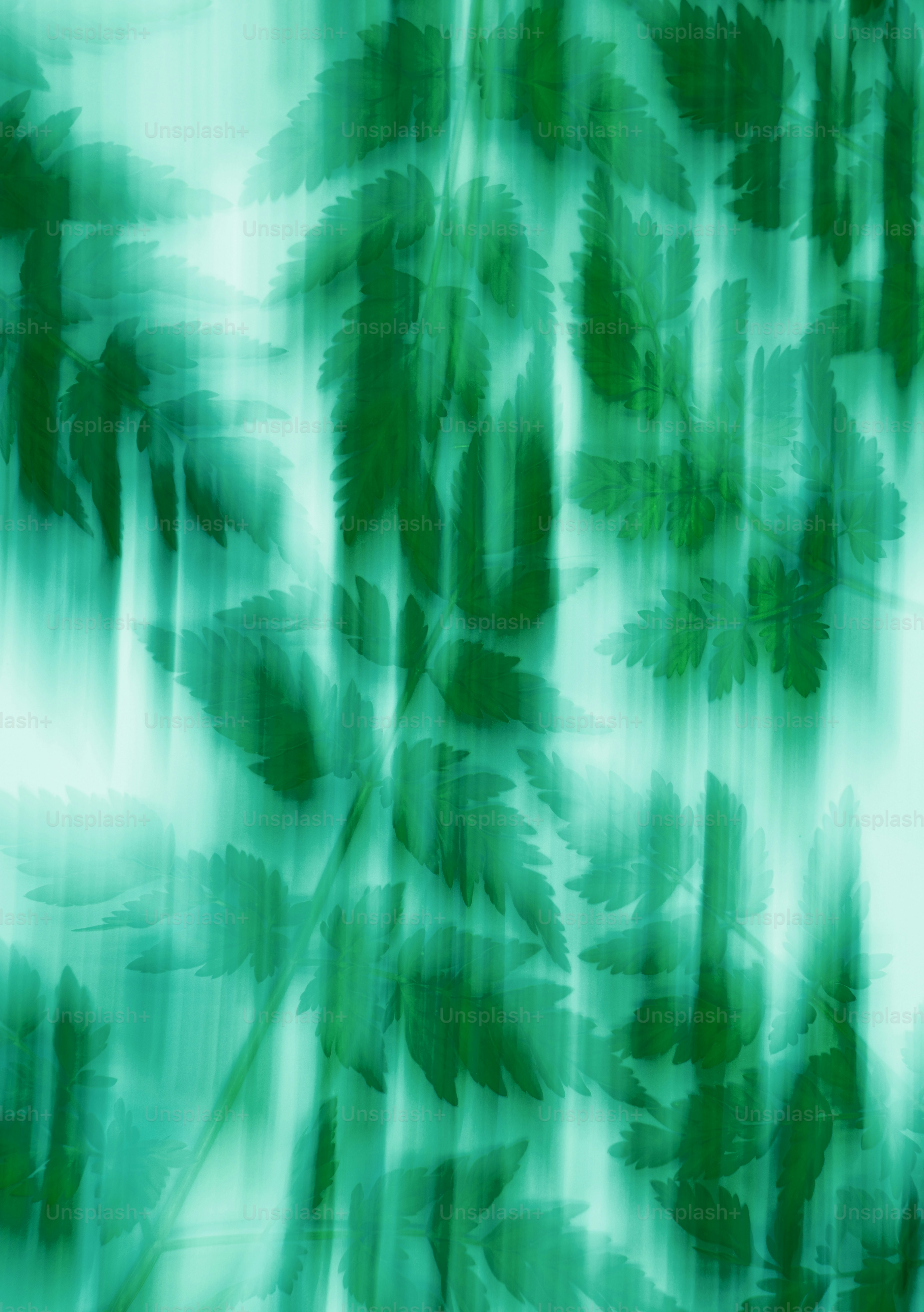 Blurred green leaves create an abstract, artistic effect.