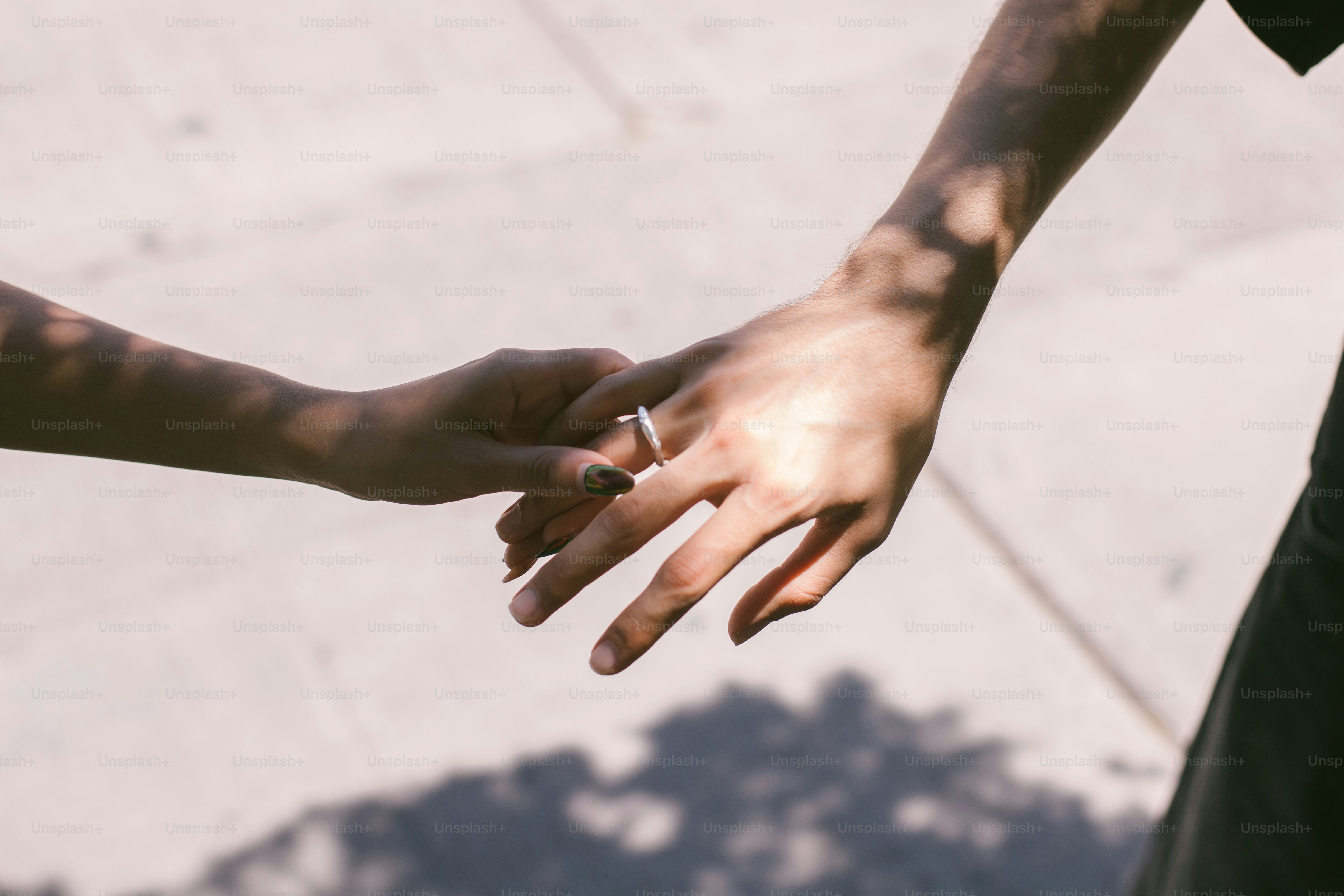 Holding hands: a symbol of love and connection.