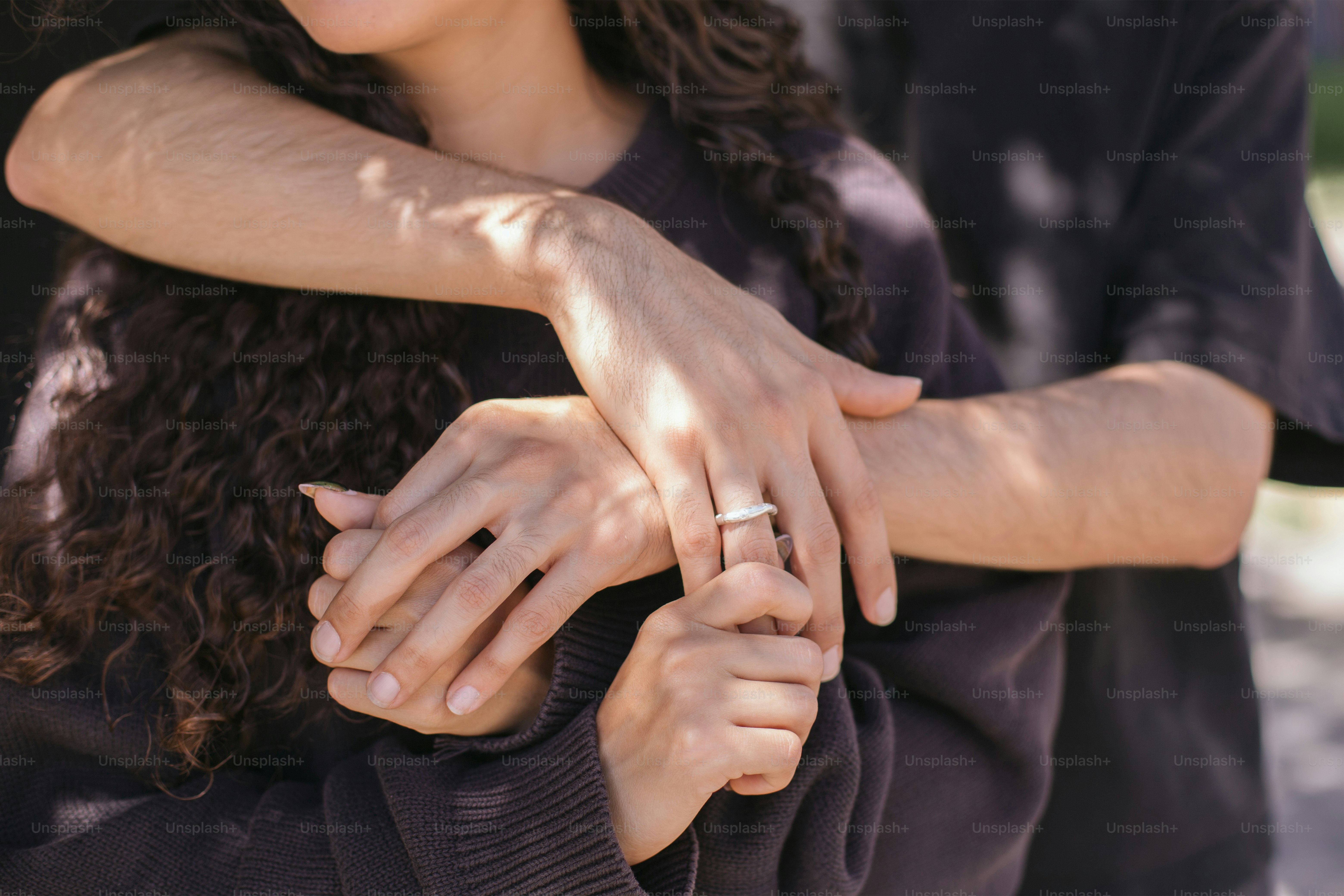 A couple shares an intimate embrace.