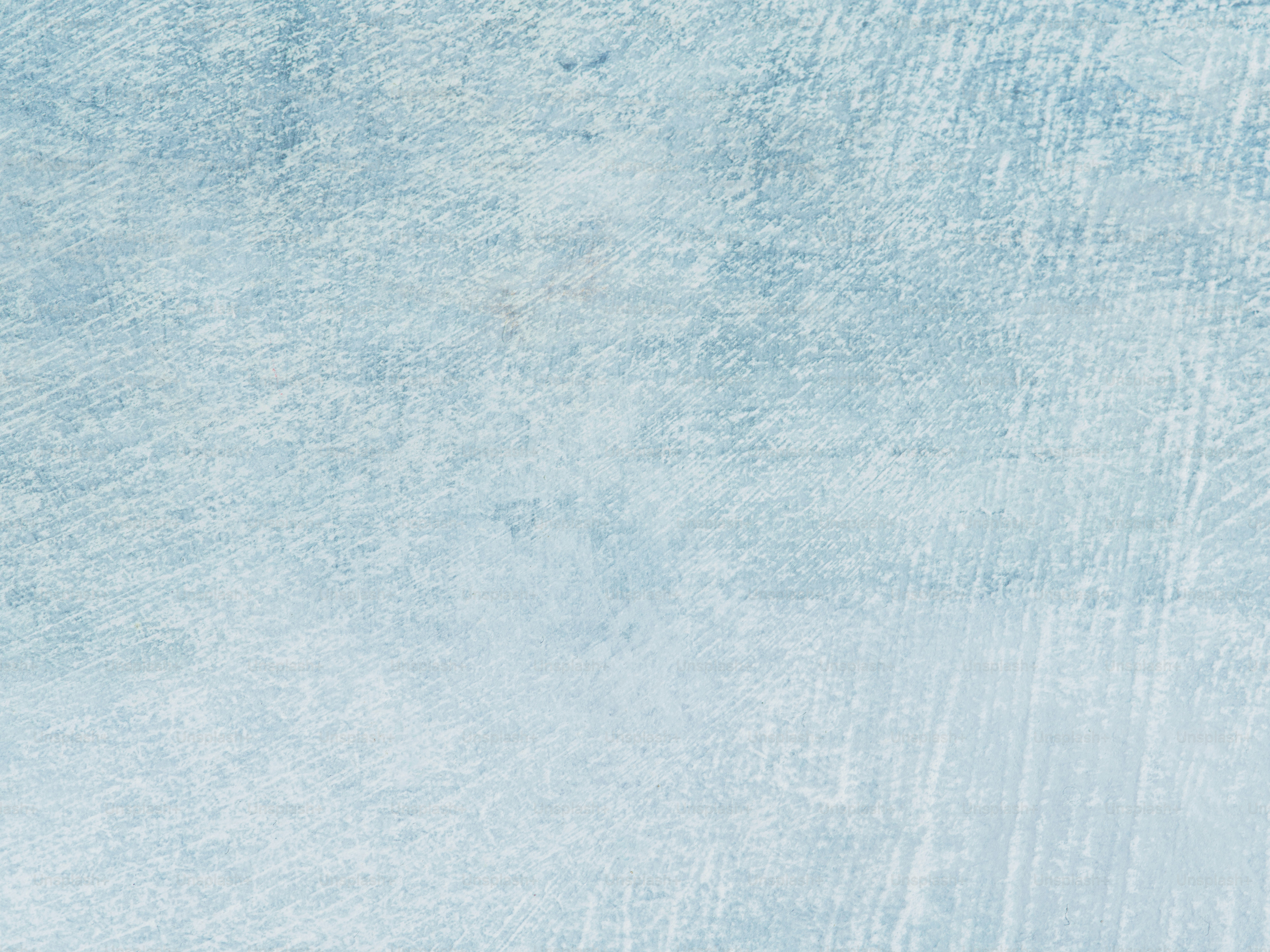 The image shows a textured, light