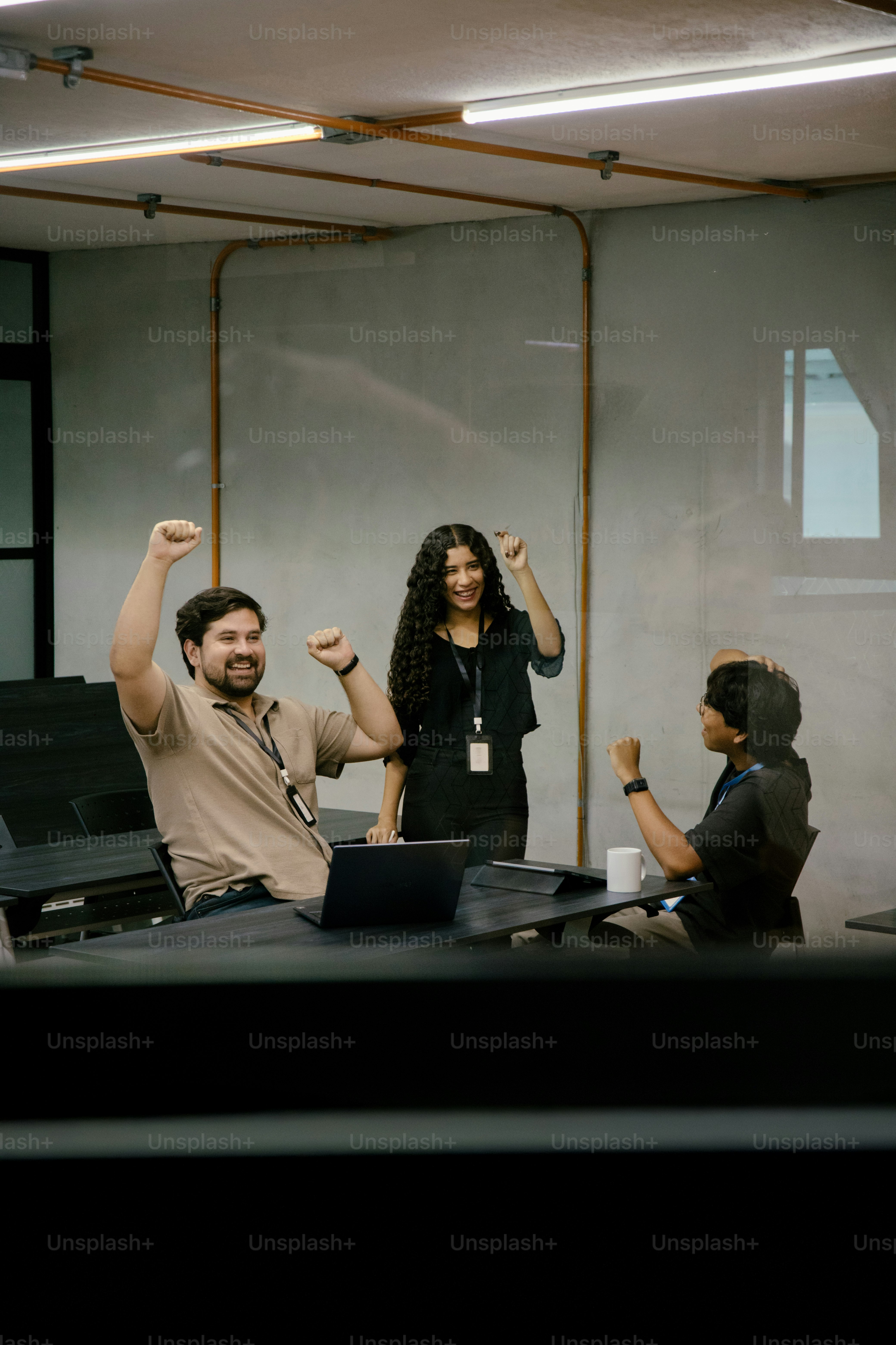 Government officers reviewing Assamese documents