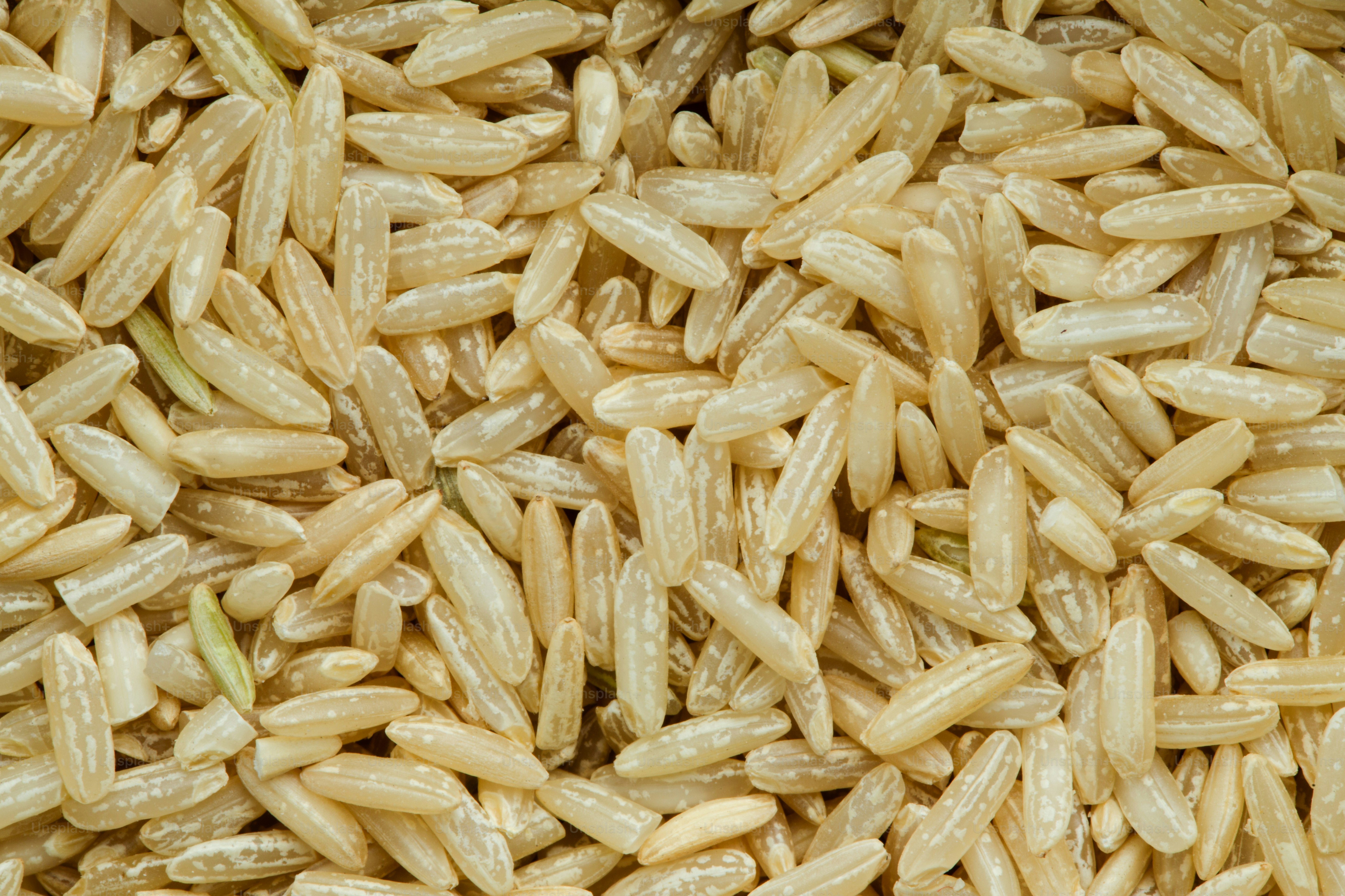 Close-up of a pile of brown rice grains.
