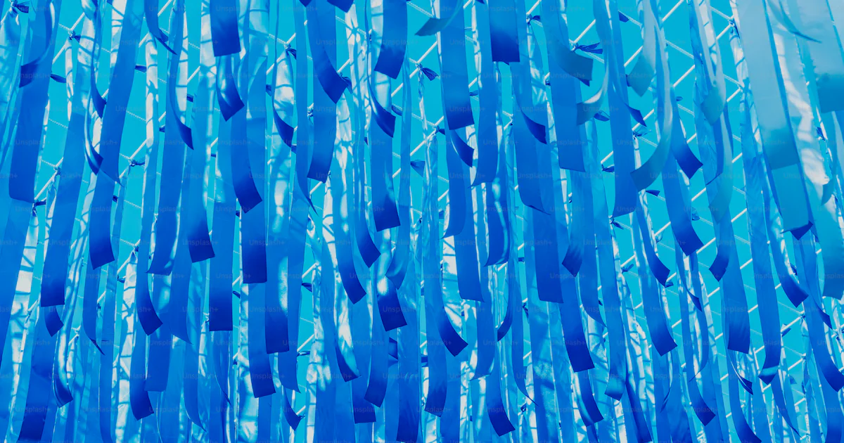 Blue Ribbons Hanging Blue ribbons hang from the ceiling. photo – Wallpaper Image on Unsplash