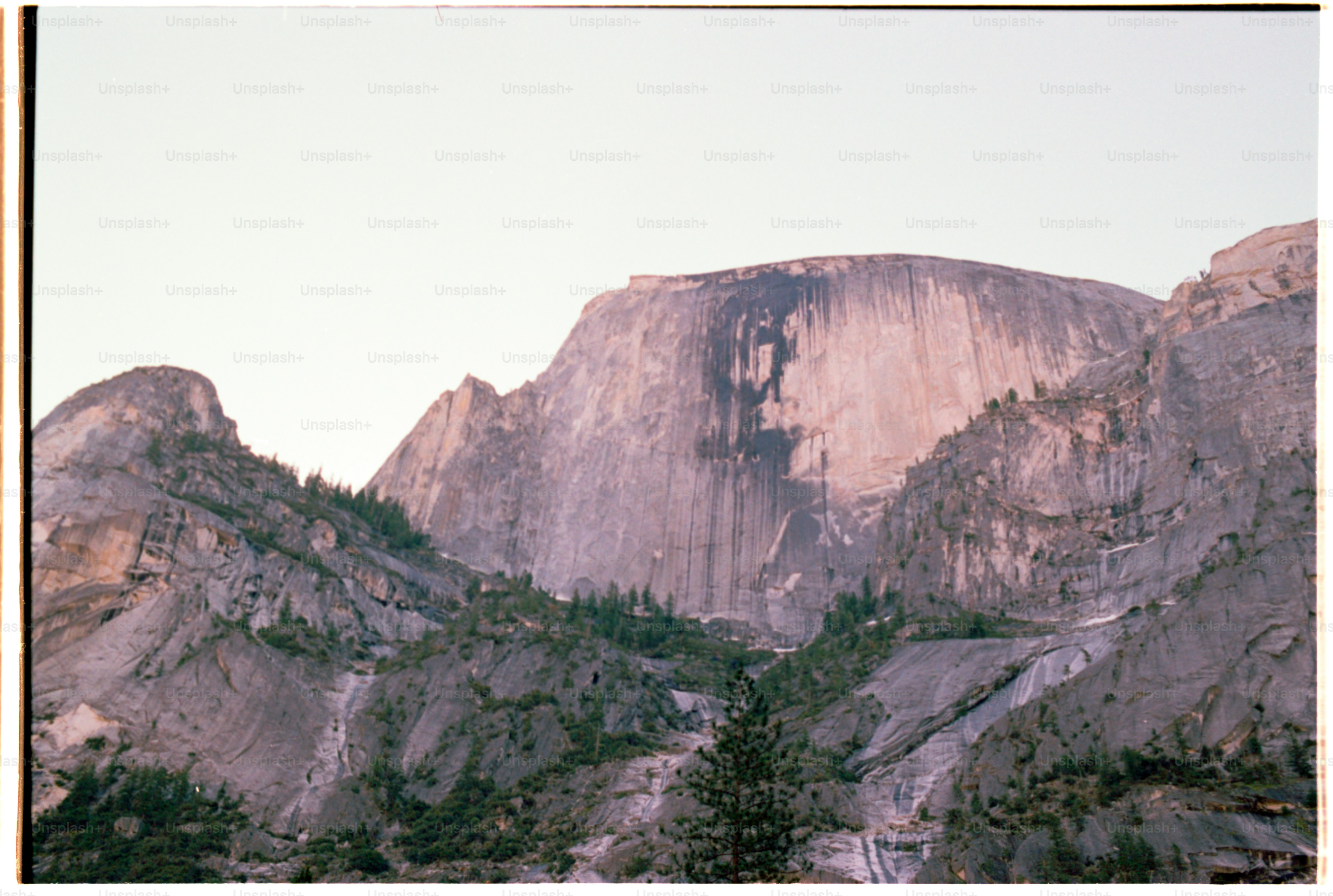 The iconic half dome rises majestically in the landscape.