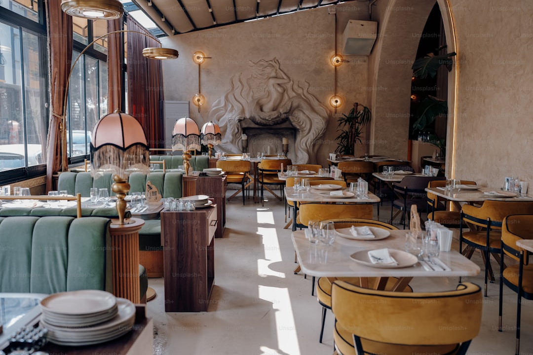 A beautifully decorated restaurant interior with tables.